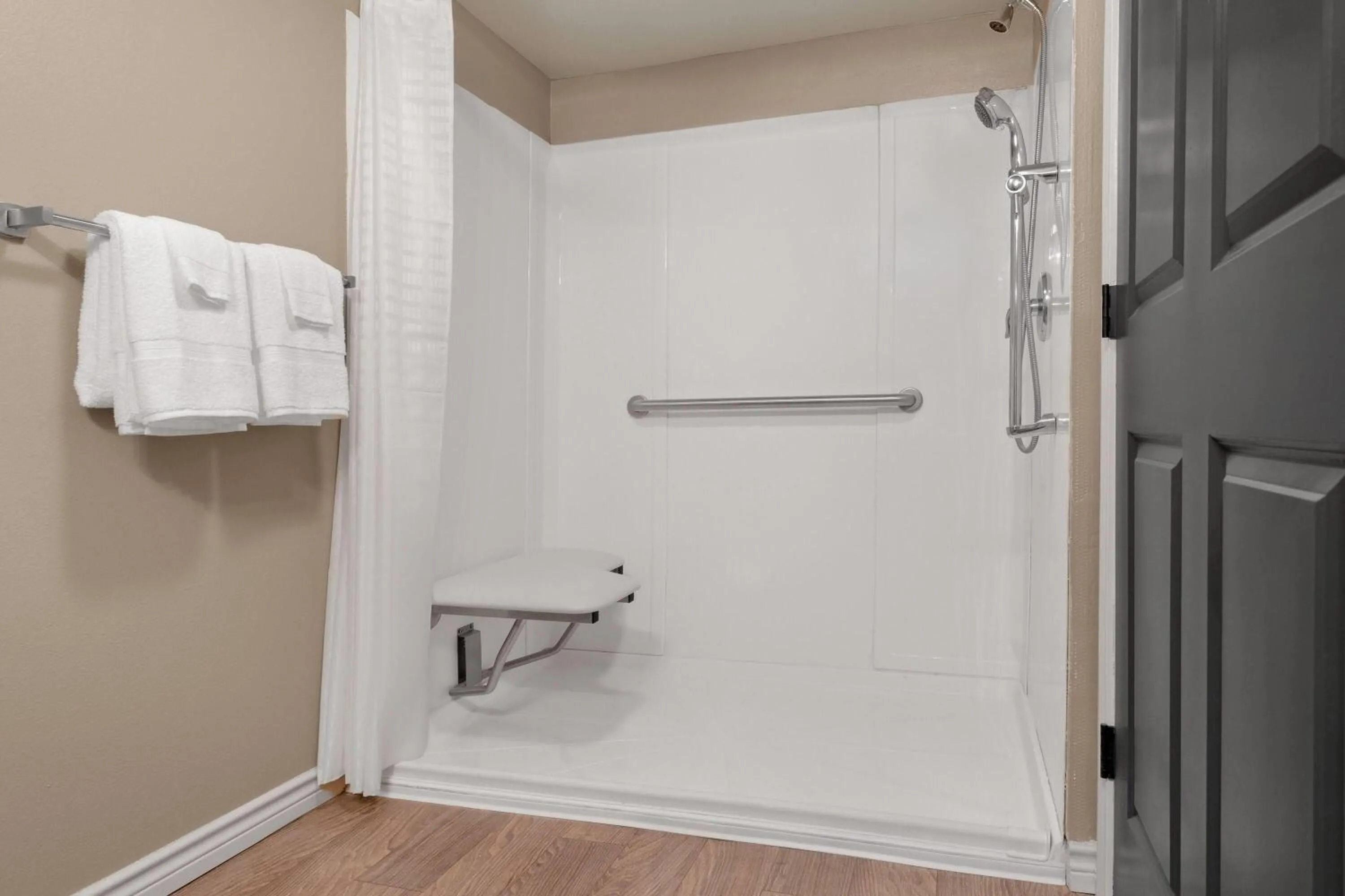 Shower in Eagle's Den Suites Andrews a Travelodge by Wyndham