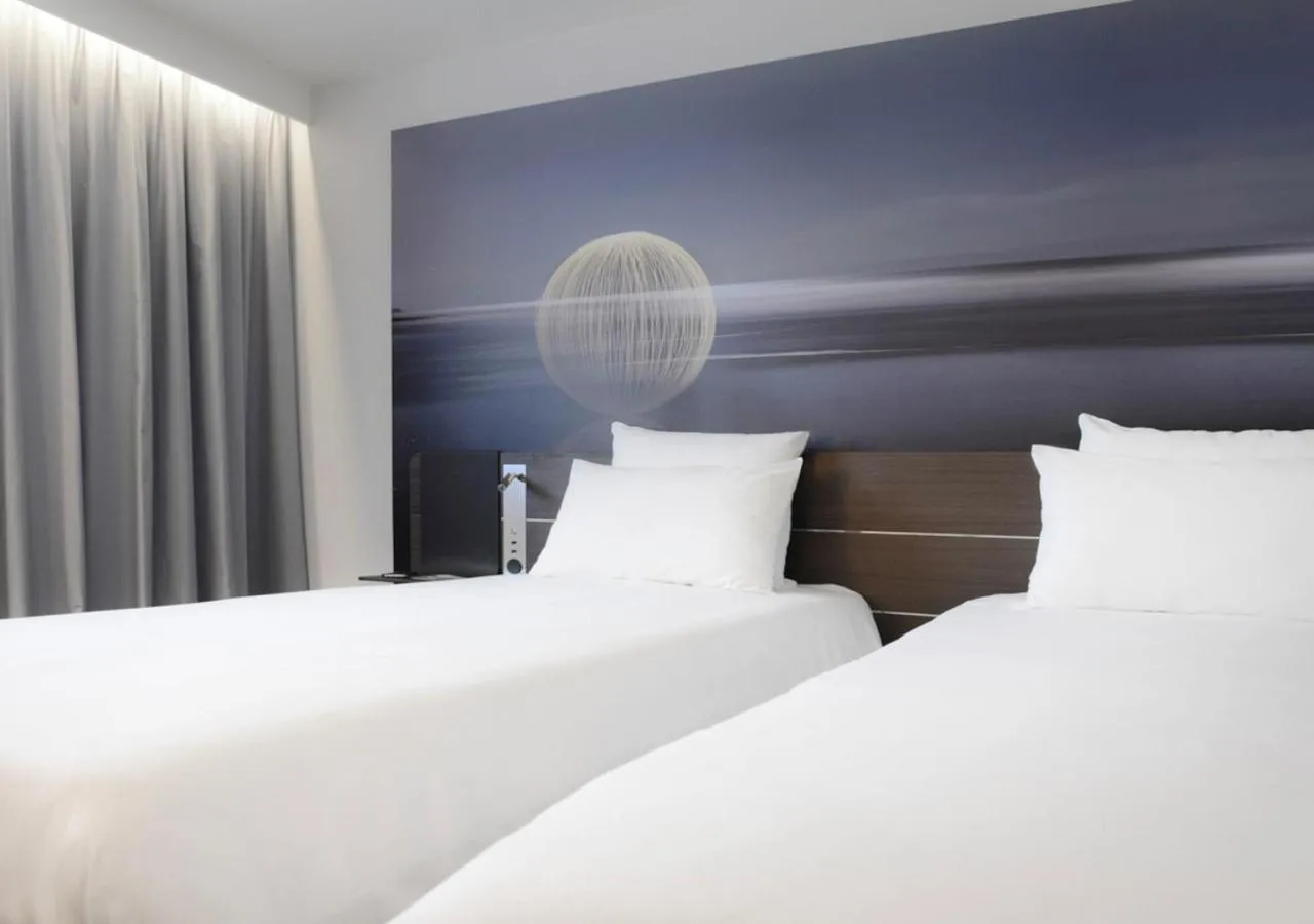 Bed in Novotel Valence Sud