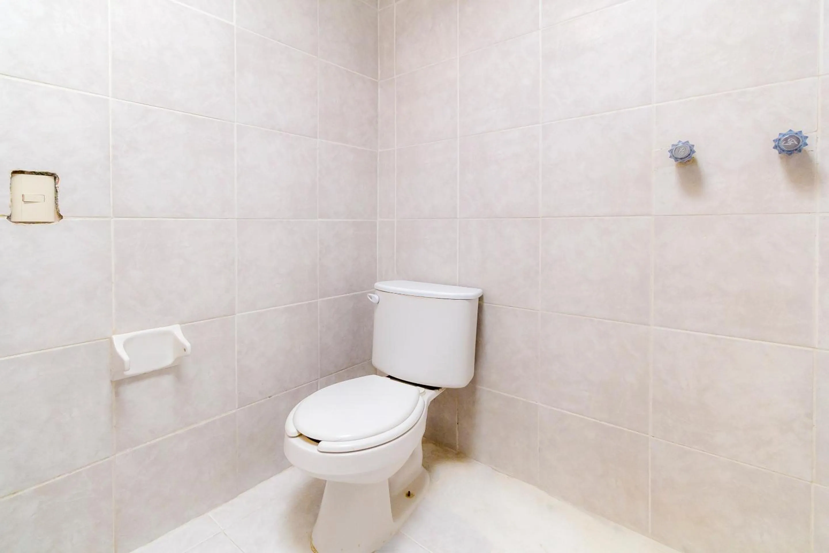 Bathroom in OYO Hotel Las Nubes,Mercado de Dulces y Artesanias Ambar