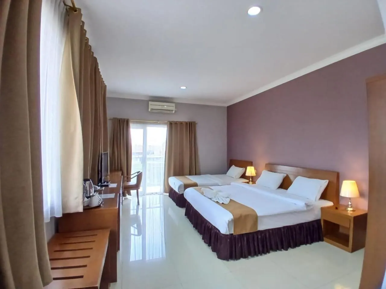 Bed in HOTEL & WISMA BINTANG JADAYAT