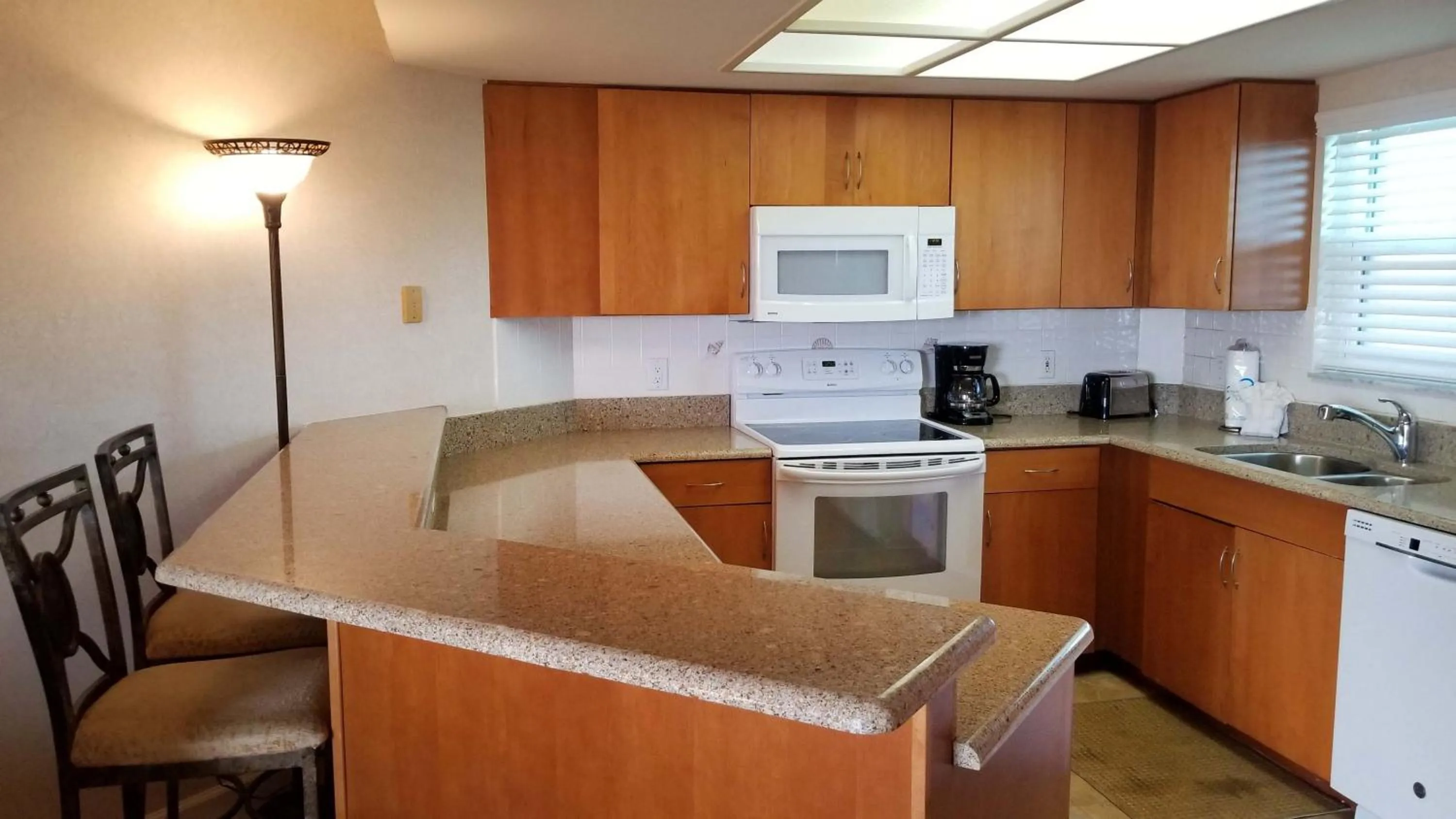 Kitchen or kitchenette in Gulf Strand Resort by Travel Resort Services