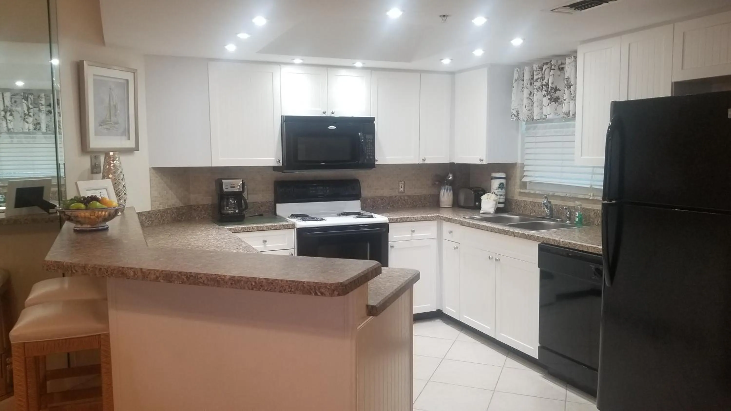 Kitchen or kitchenette in Gulf Strand Resort by Travel Resort Services