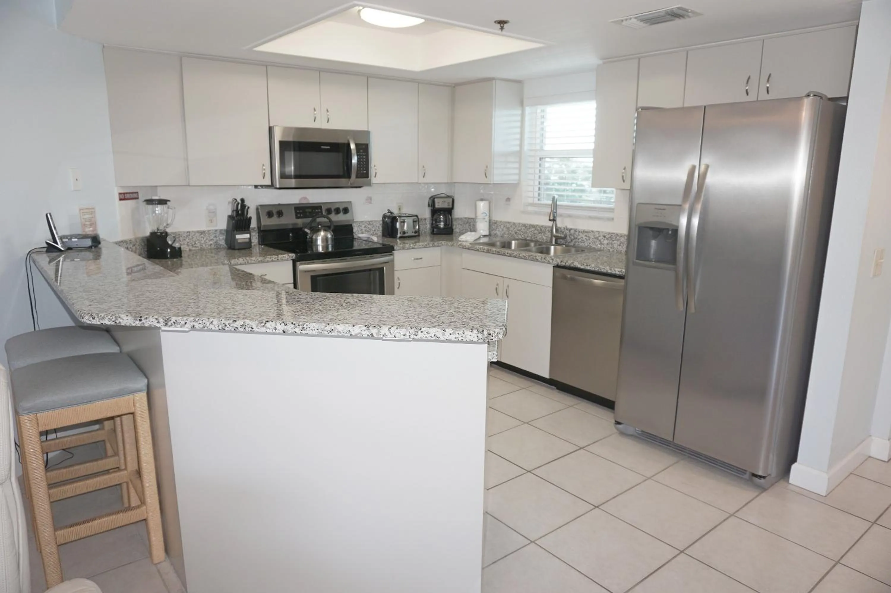 Kitchen or kitchenette in Gulf Strand Resort by Travel Resort Services