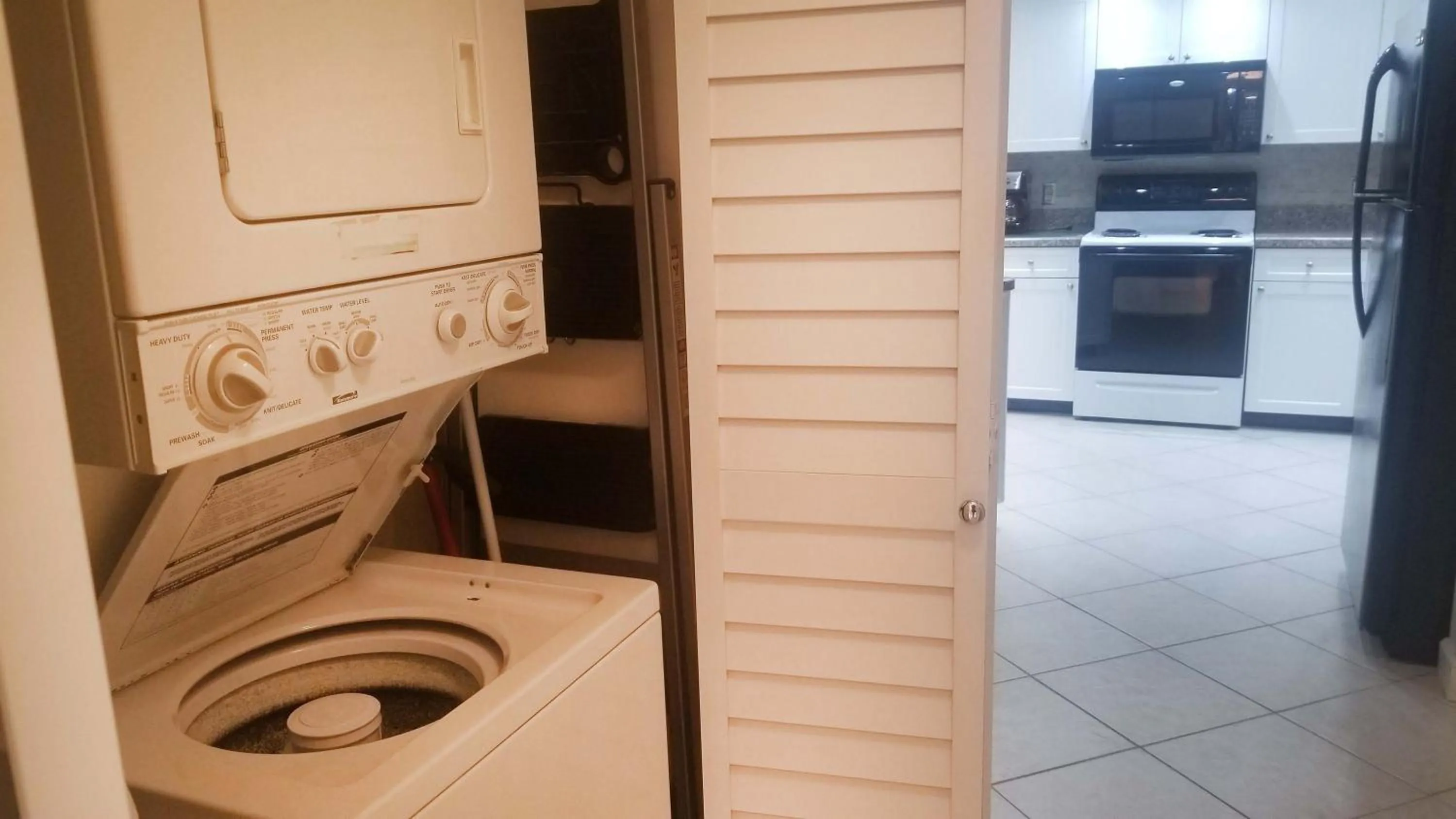 washing machine in Gulf Strand Resort by Travel Resort Services