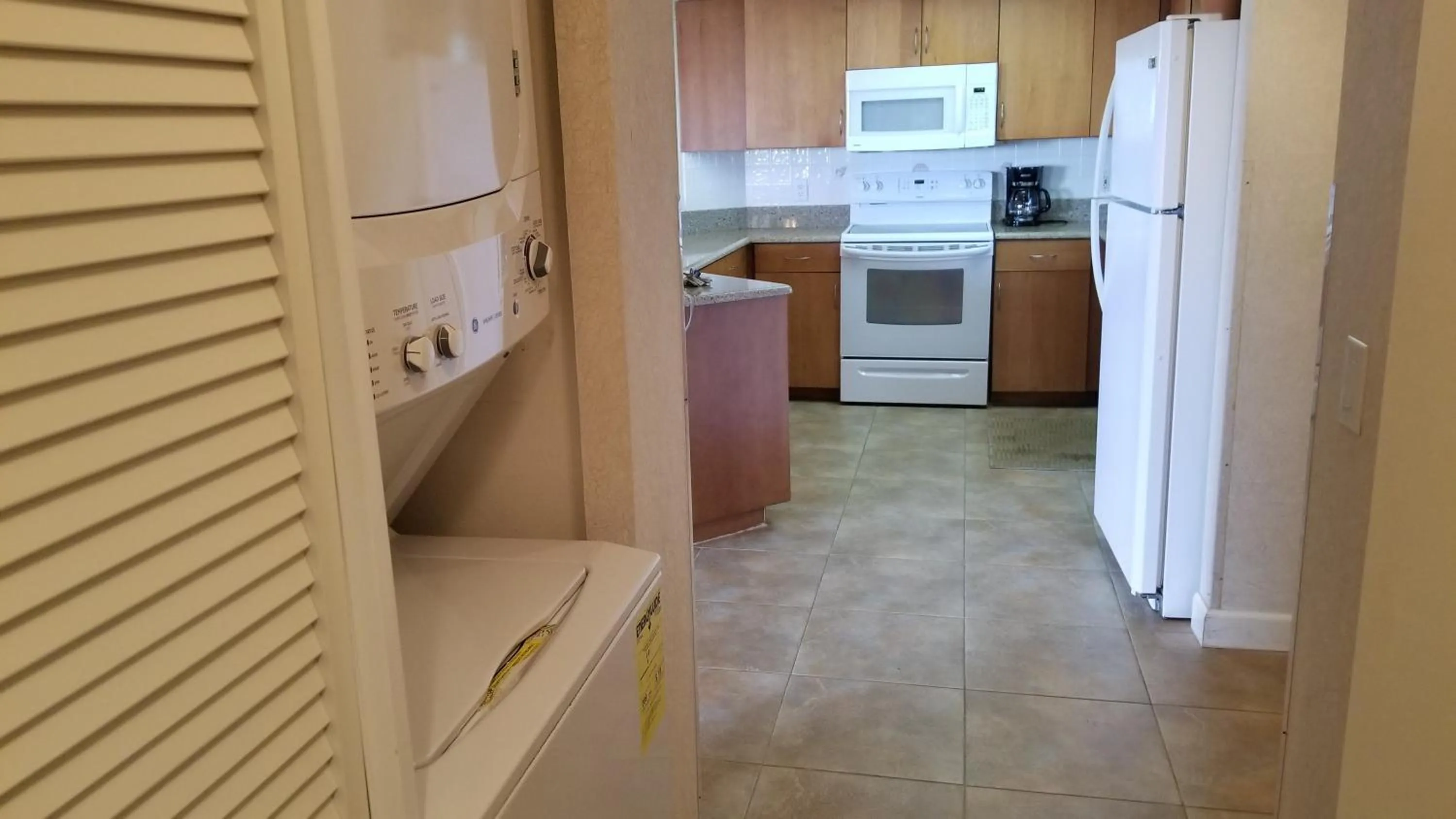 washing machine in Gulf Strand Resort by Travel Resort Services