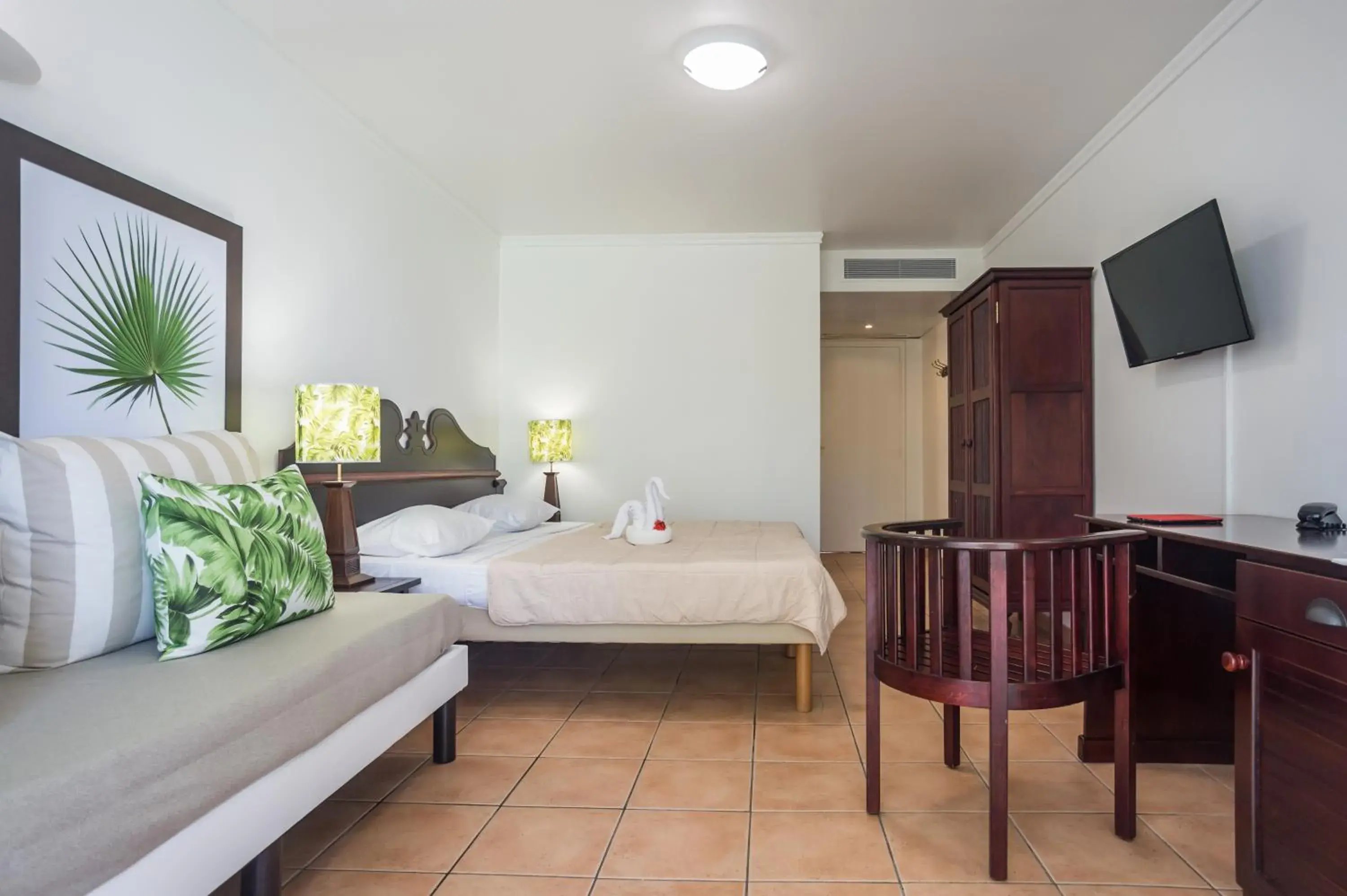 Communal lounge/ TV room, Bed in Village Pierre & Vacances Sainte Luce Communal lounge/ TV room, Bed in Village Pierre & Vacances Sainte Luce