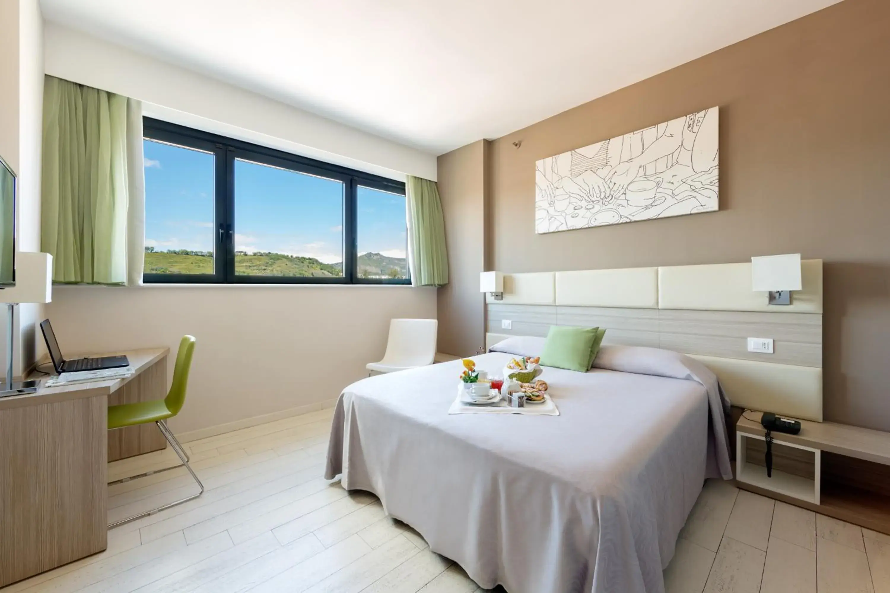 Bed in Hotel Cristina Bed in Hotel Cristina