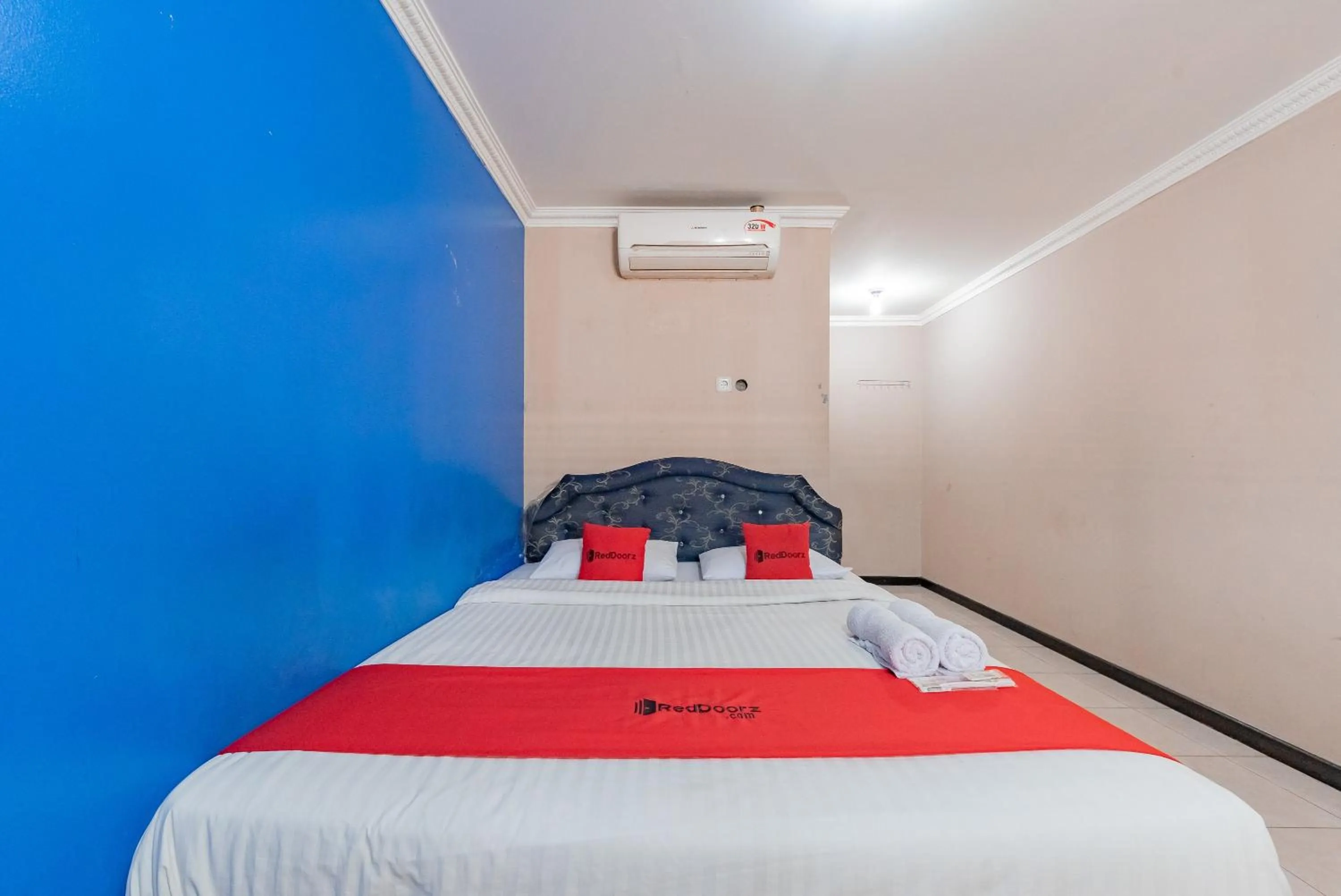 Bed in RedDoorz Syariah At Cibadak Sukabumi