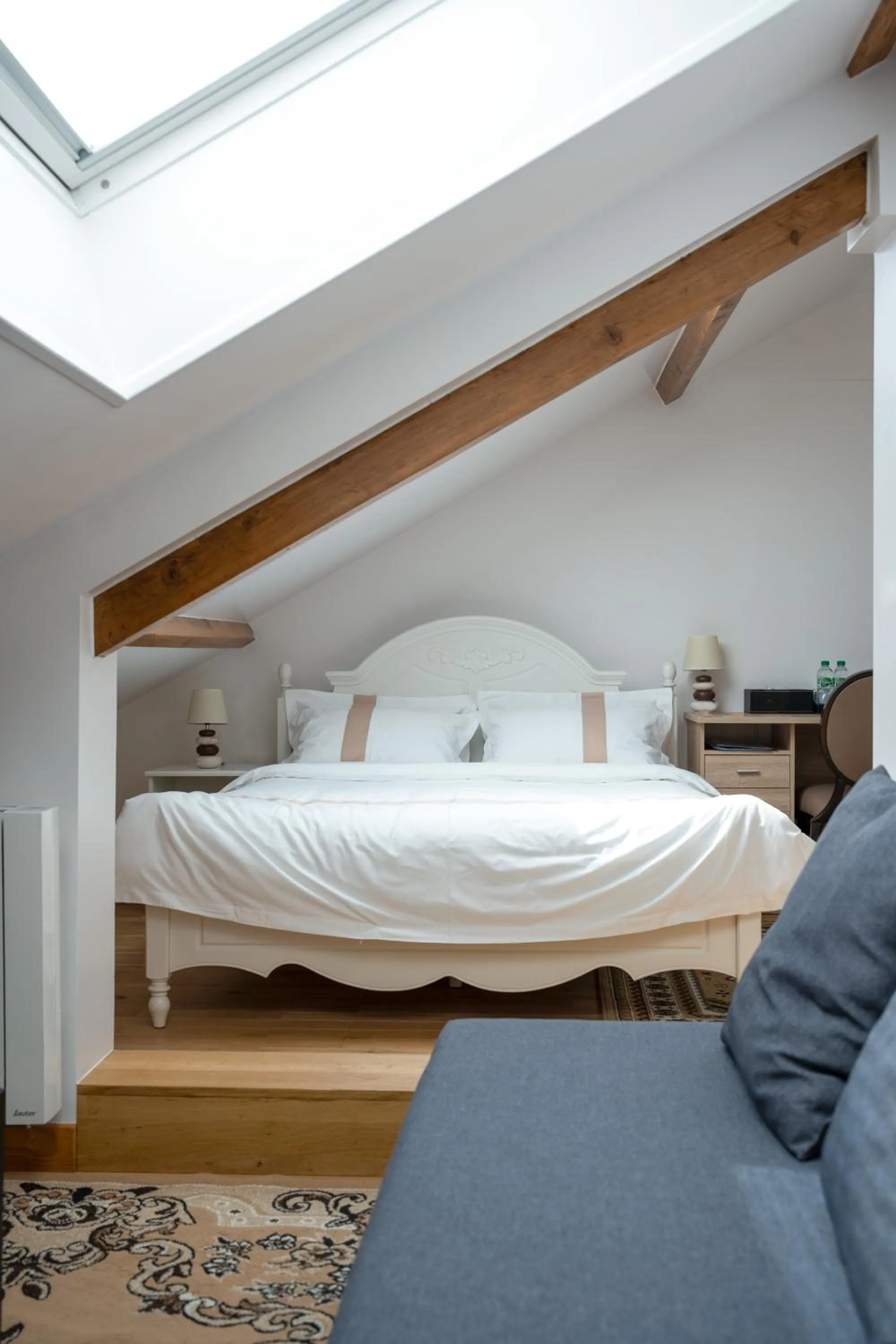 Living room, Bed in La Maison Charentonneau