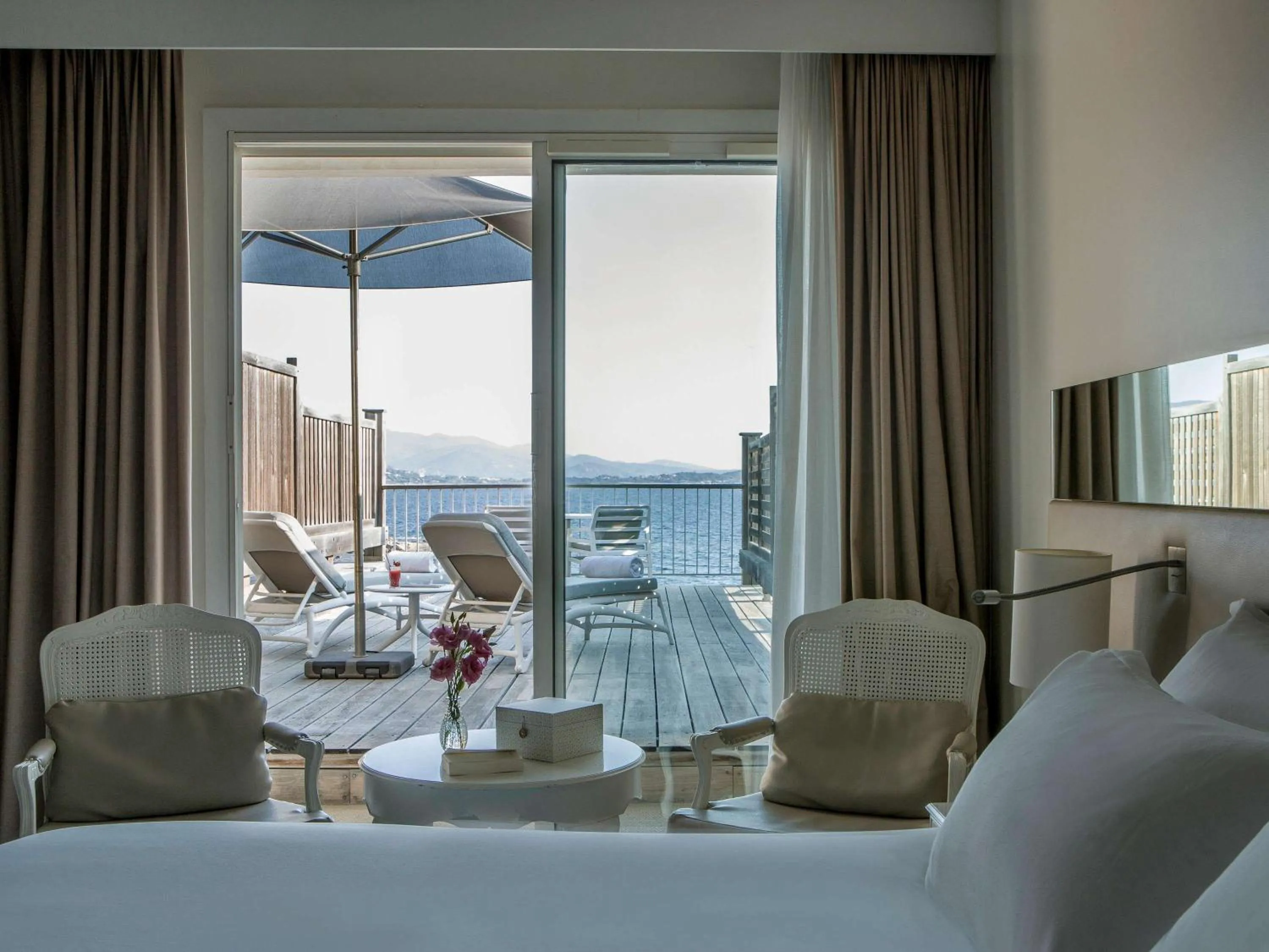 Photo of the whole room, Bed in Sofitel Golfe d'Ajaccio Thalassa Sea & Spa