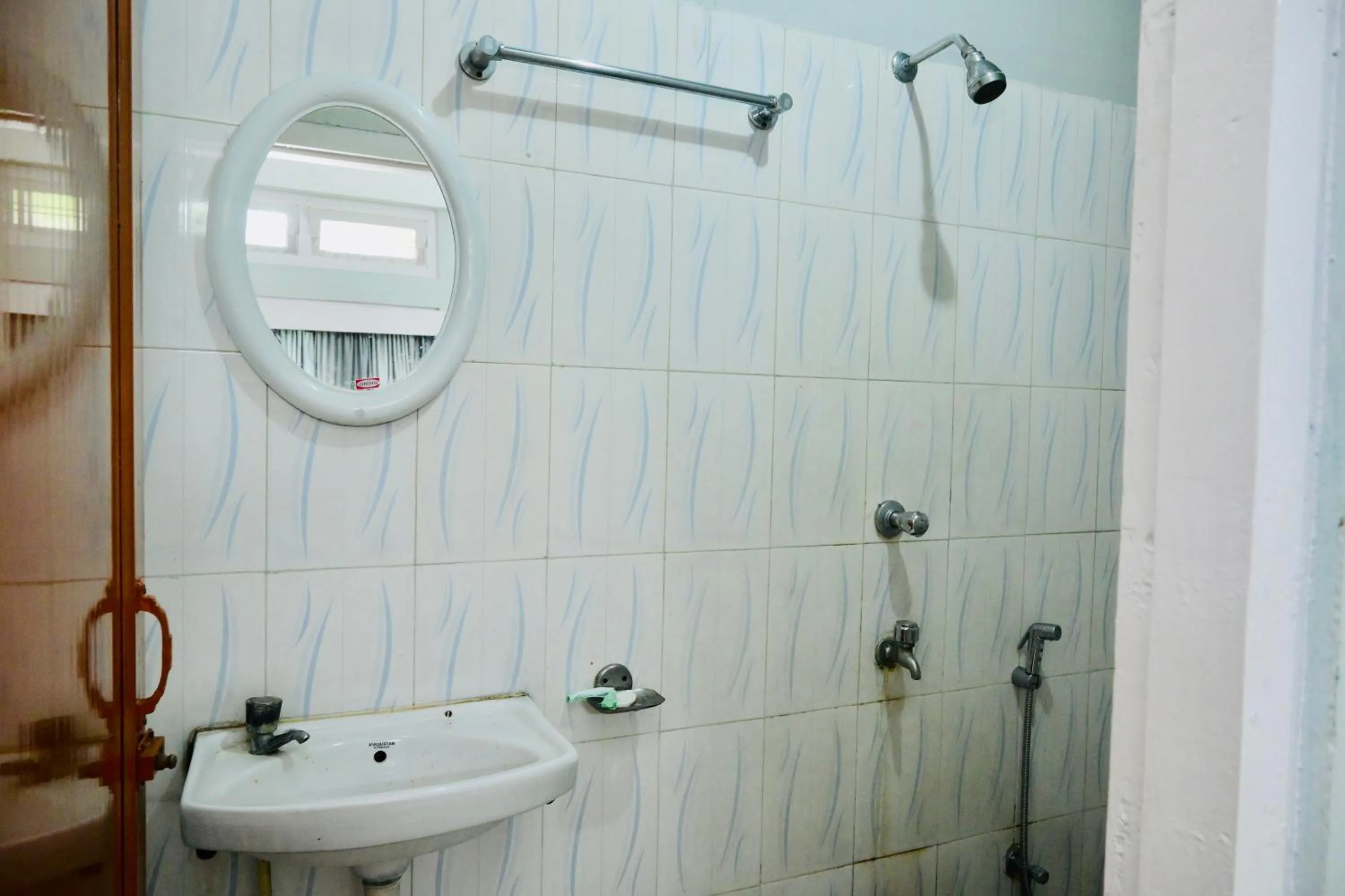 Bathroom in Namaskar Lodge and Homestay