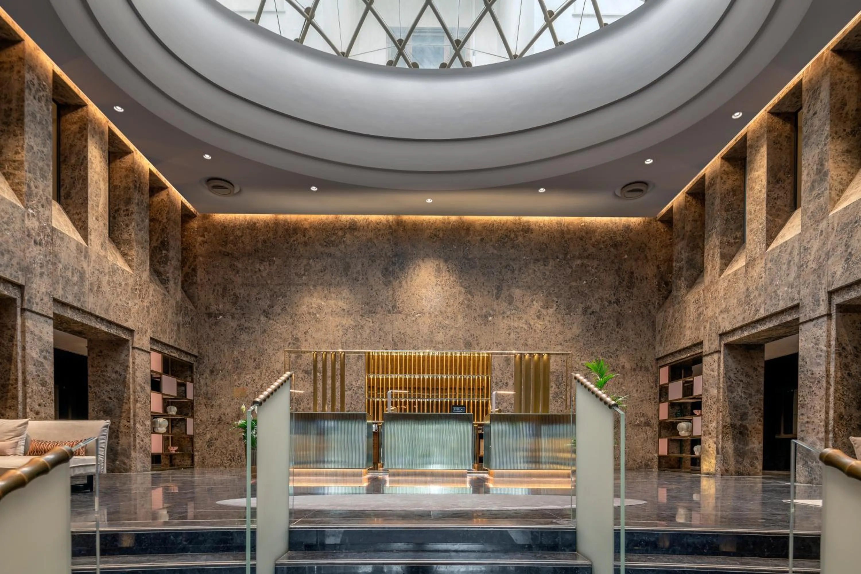 Lobby or reception in Hilton Turin Centre