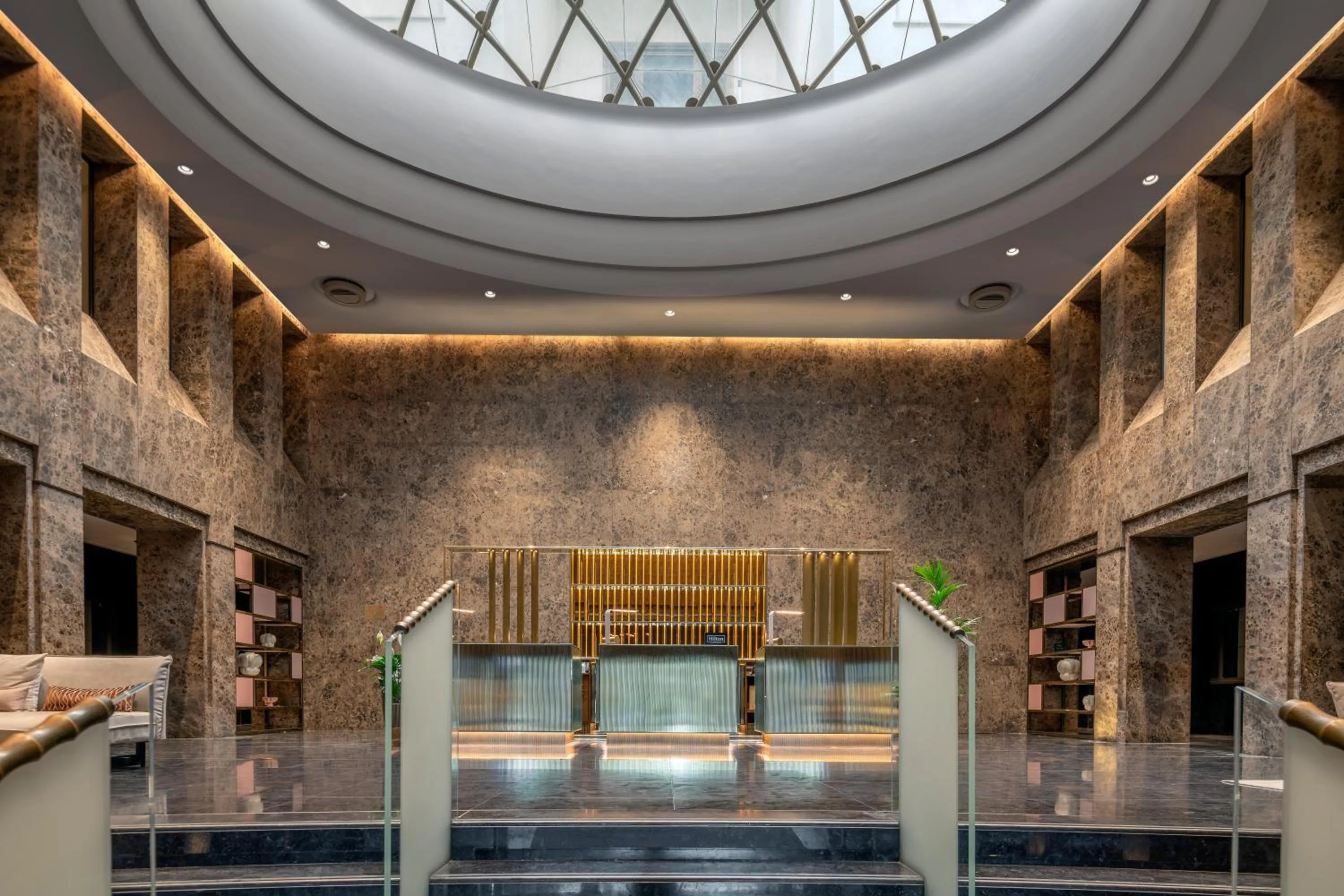Lobby or reception in Hilton Turin Centre