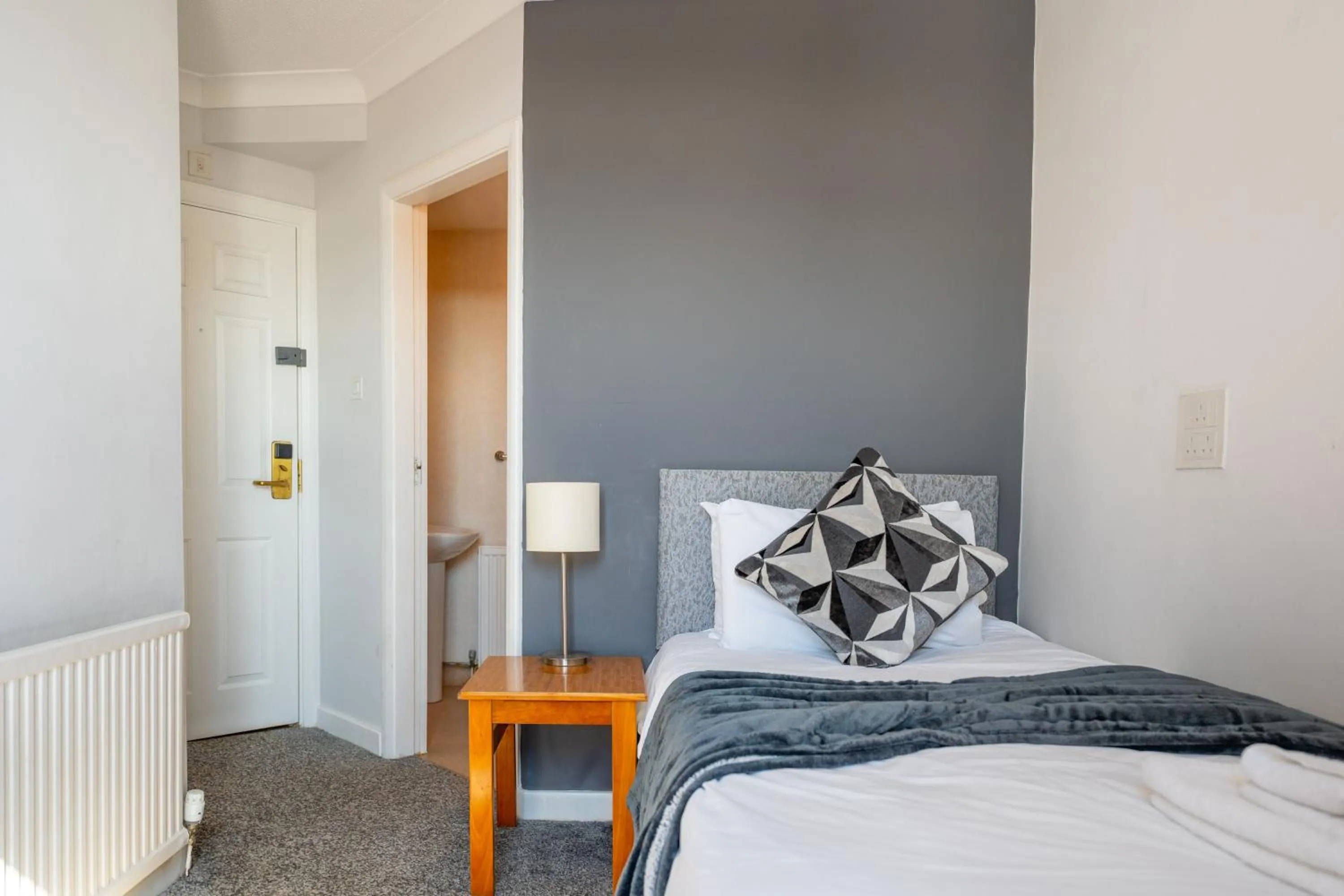 Bed in The Strathmore Hotel