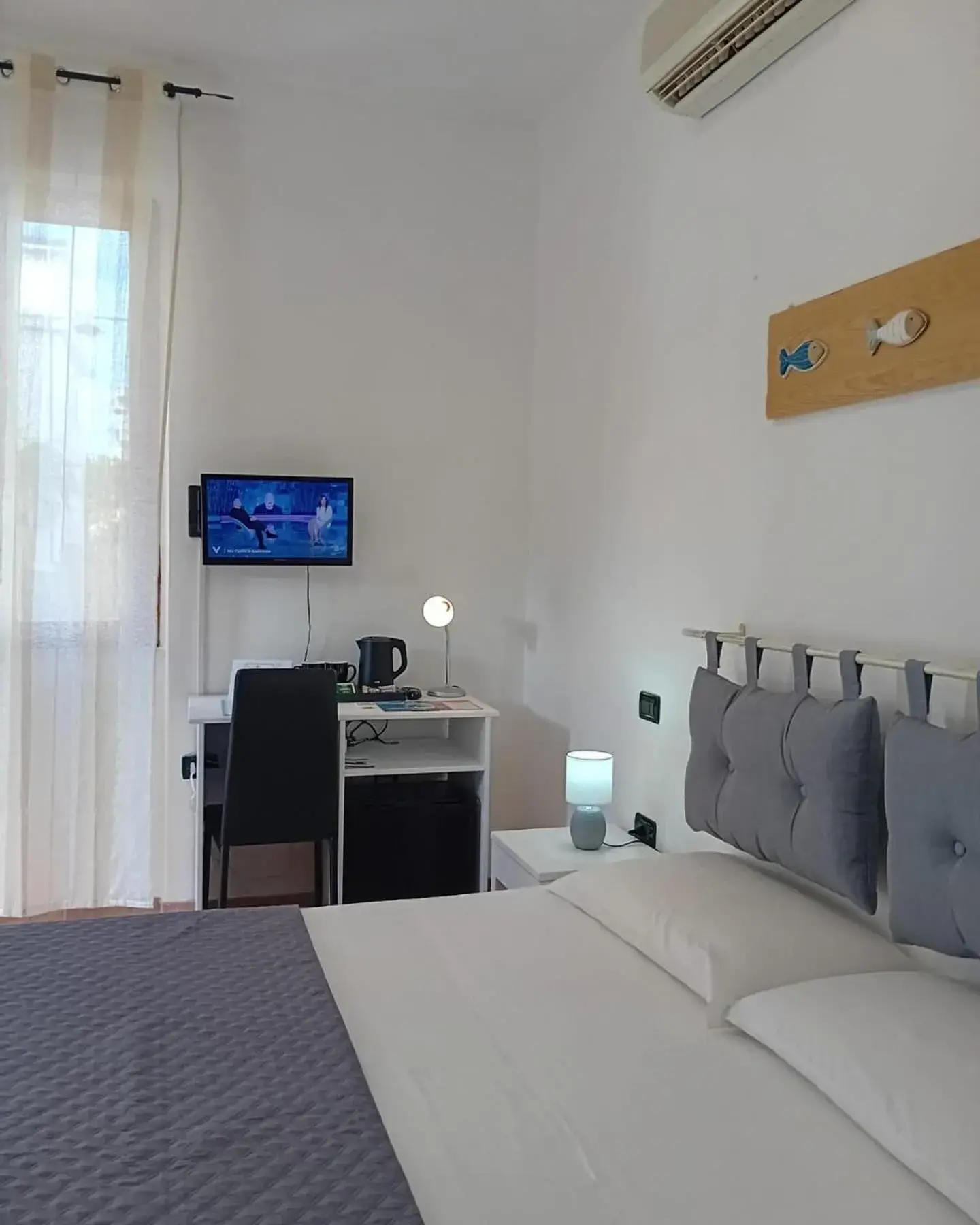 Standard Quadruple Room in Il Canarino affittacamere Standard Quadruple Room in Il Canarino affittacamere