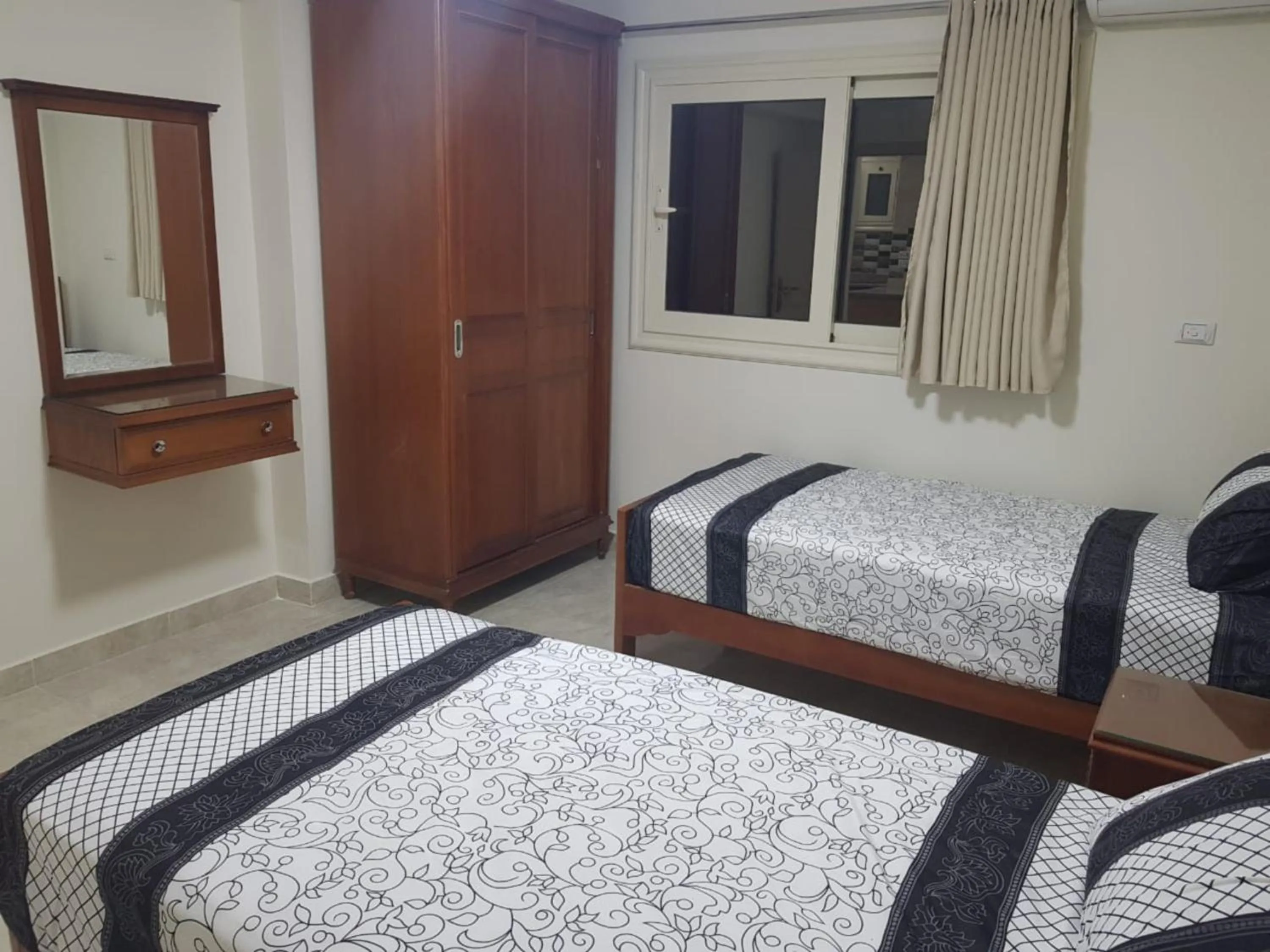 Bedroom, Bed in Al Raya Apartments