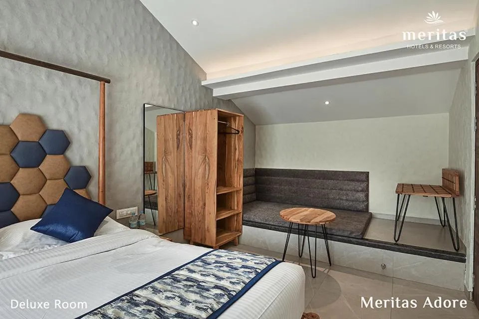 Bed in Meritas Adore Resort