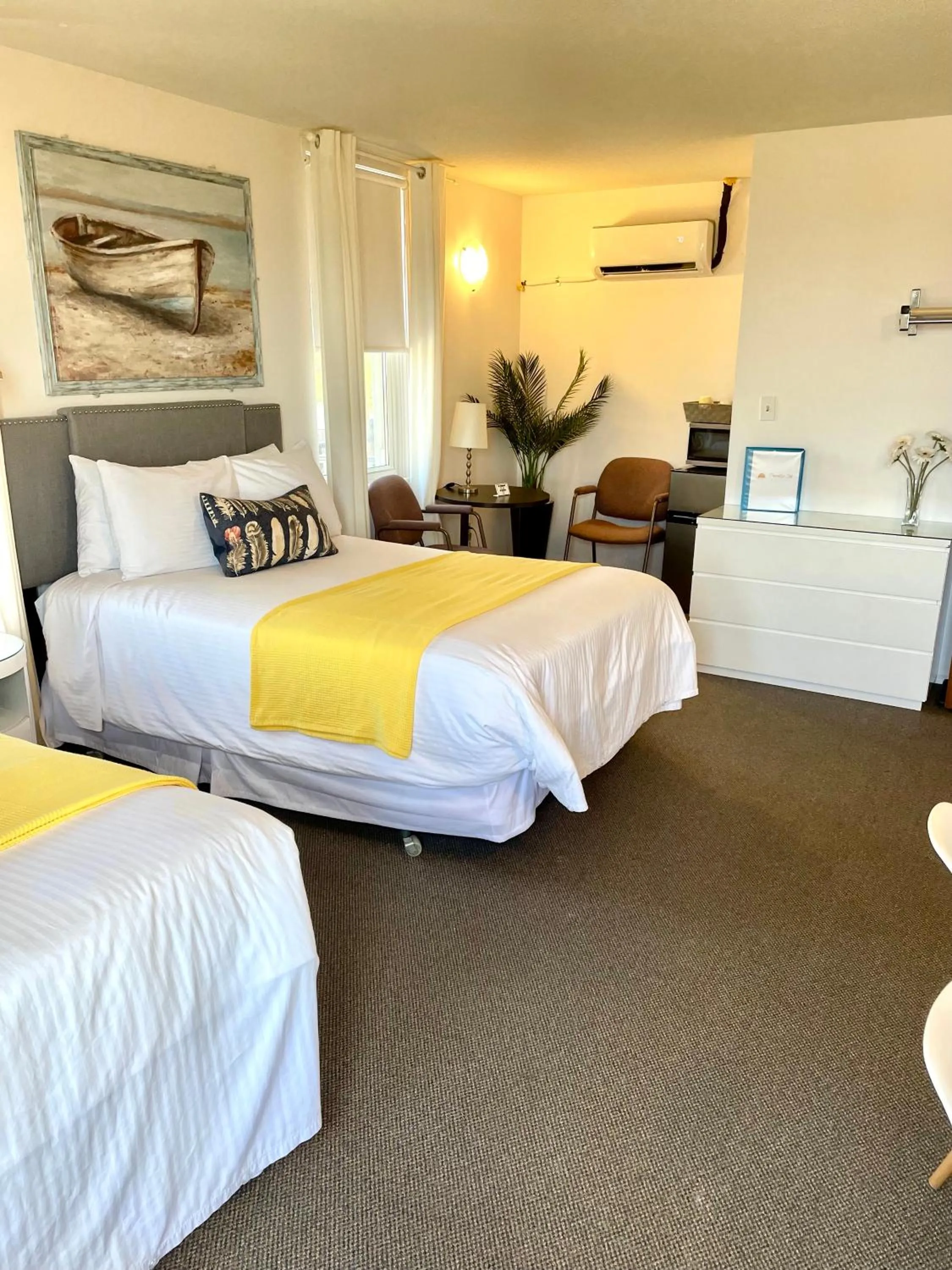 Seating area, Bed in Paradise Inn On the Beach