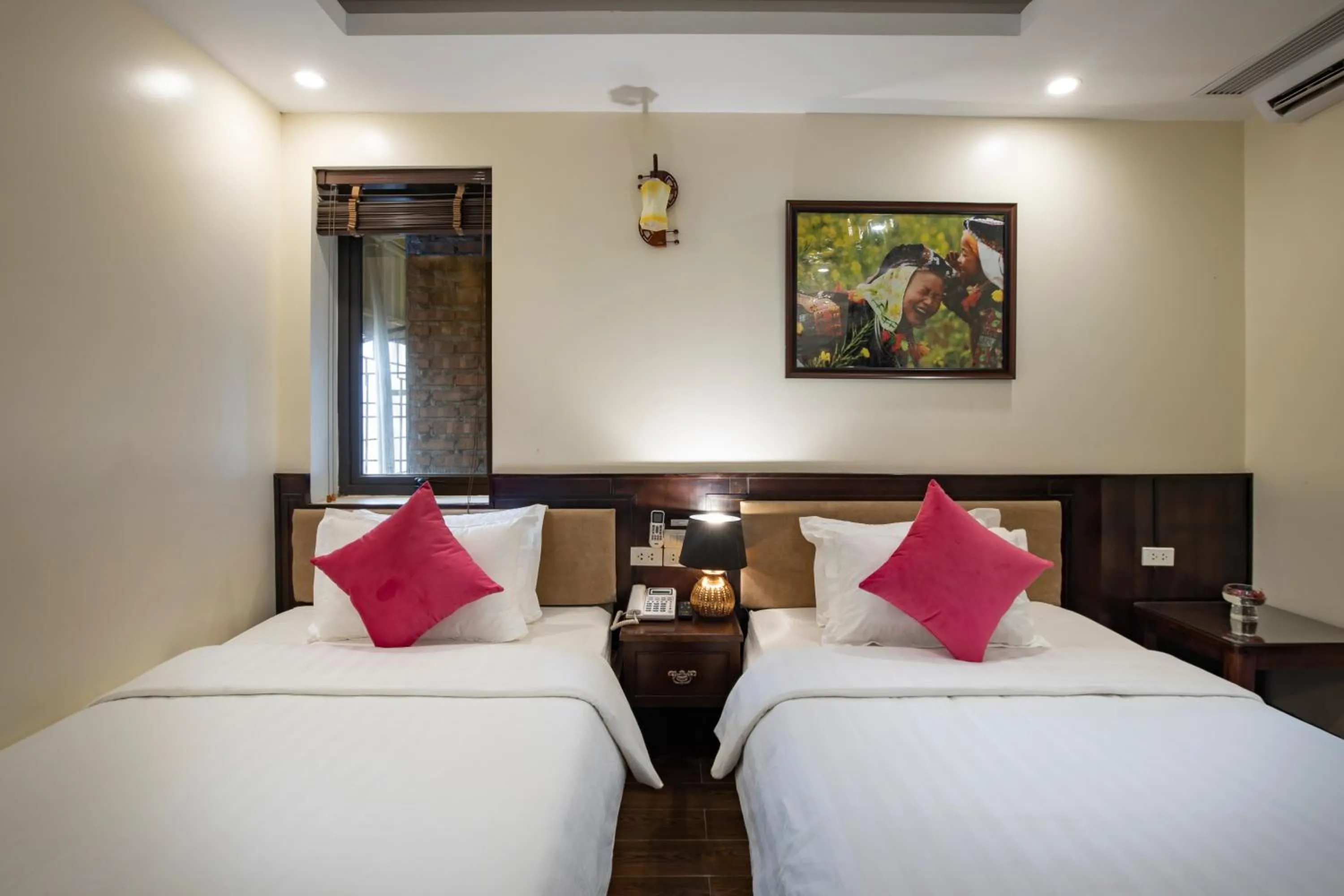 Bed in Sapphire Sapa Hotel