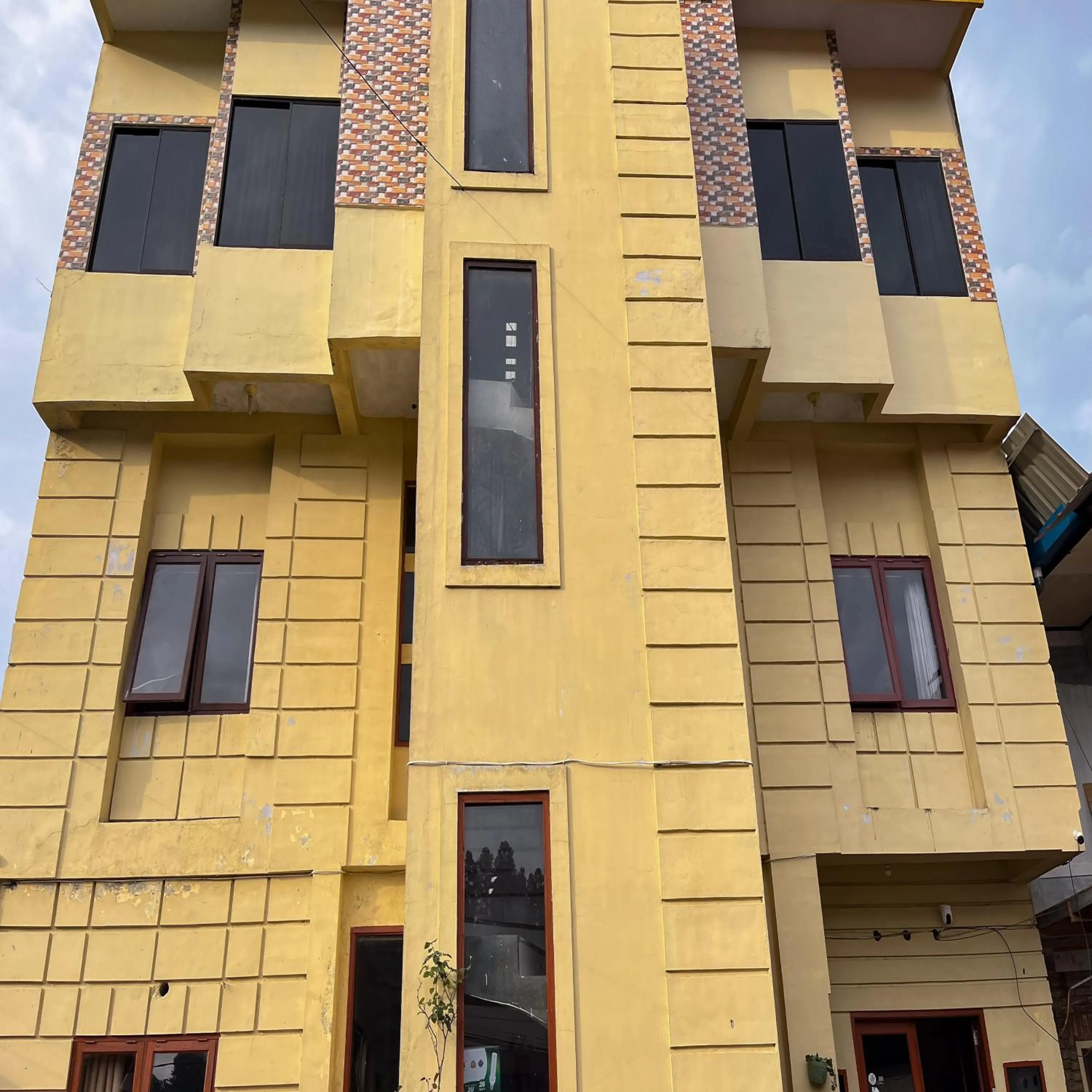Facade/entrance in RedDoorz at Serdika Pavilion Berastagi