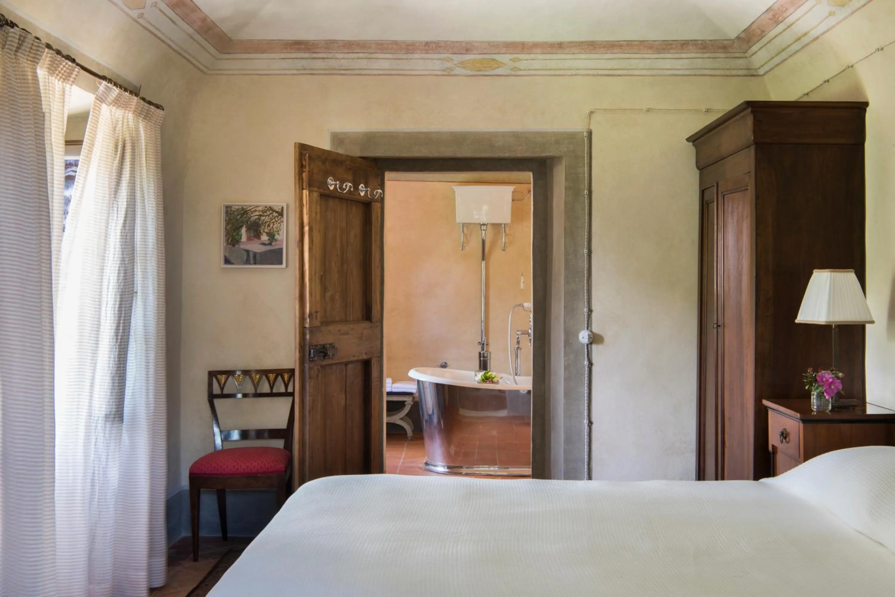Bathroom, Bed in Borgo Pignano Tuscany