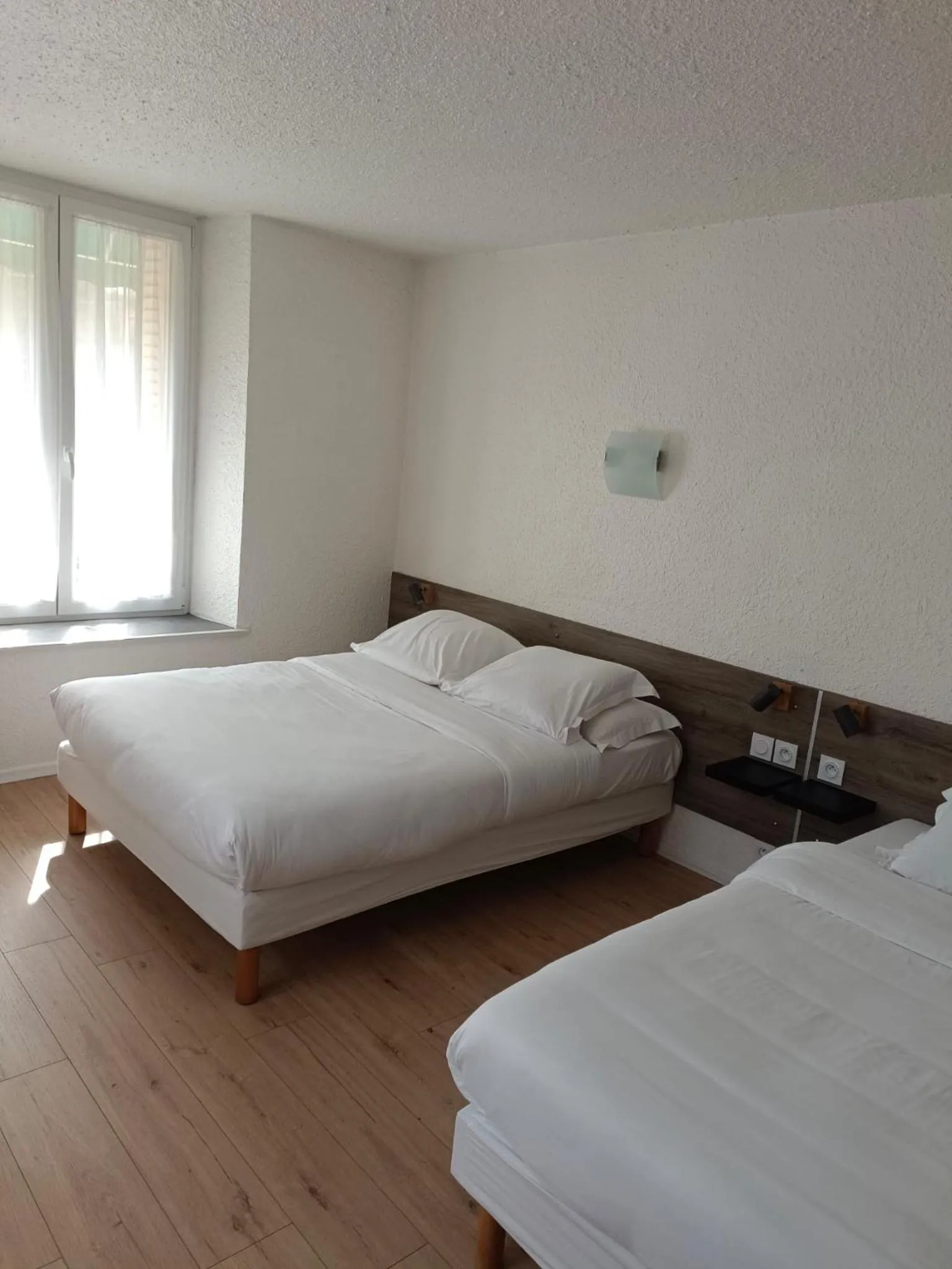 Bed in Cit'Hotel du Tigre