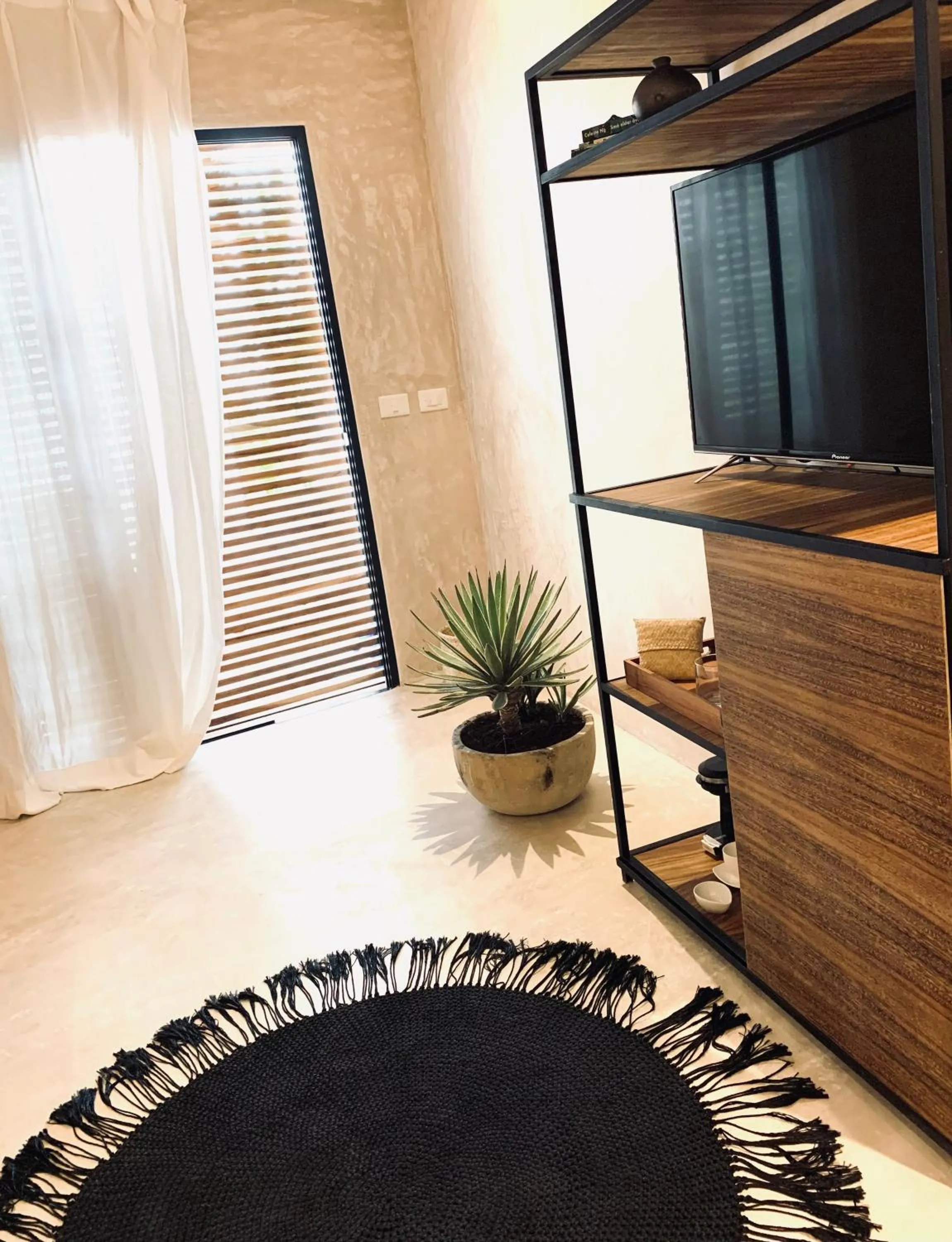 TV and multimedia in Apartments & Suites MADRE Holbox Self-Check IN