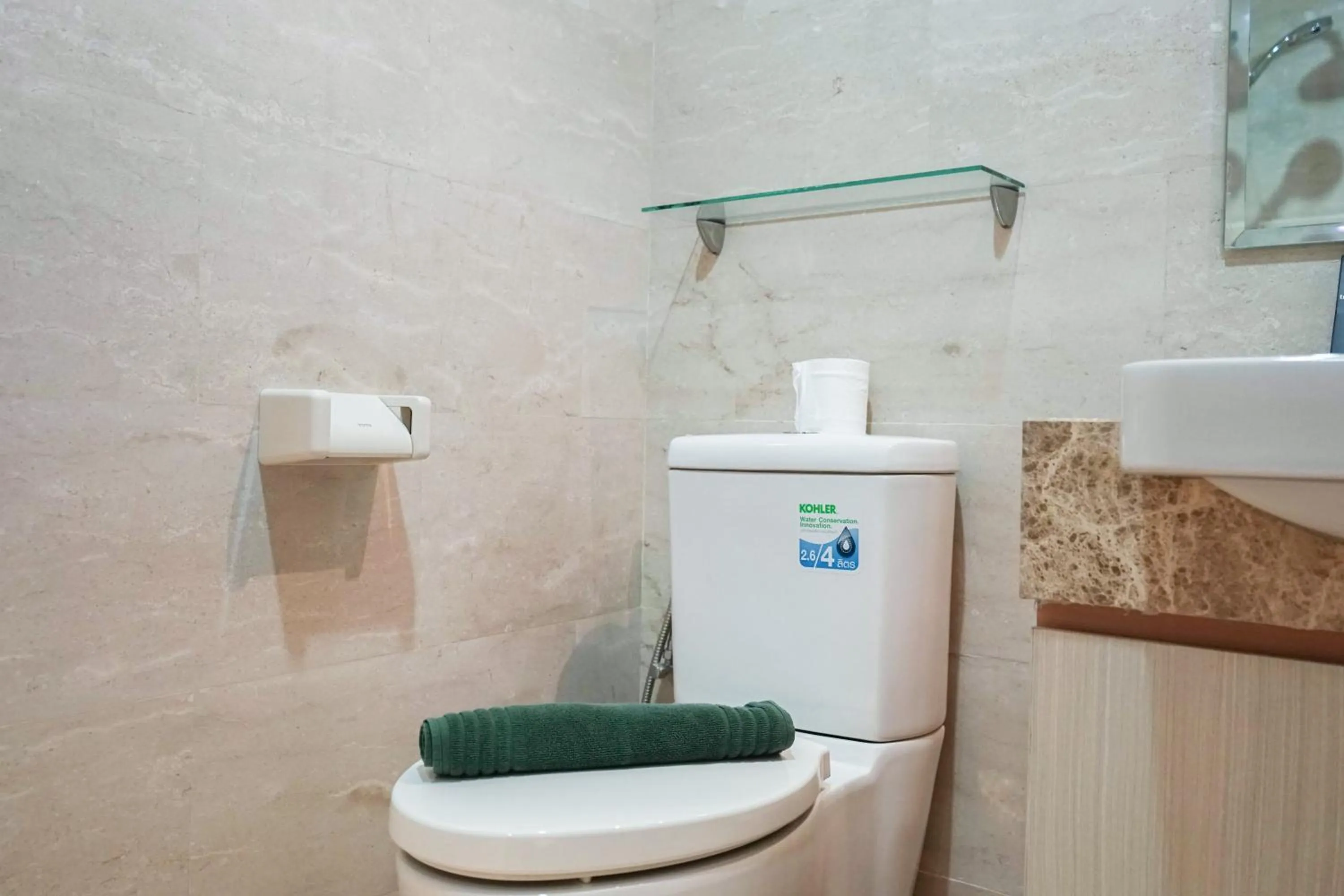 Bathroom in Stunning Studio Room at Menteng Park Apartment By Travelio