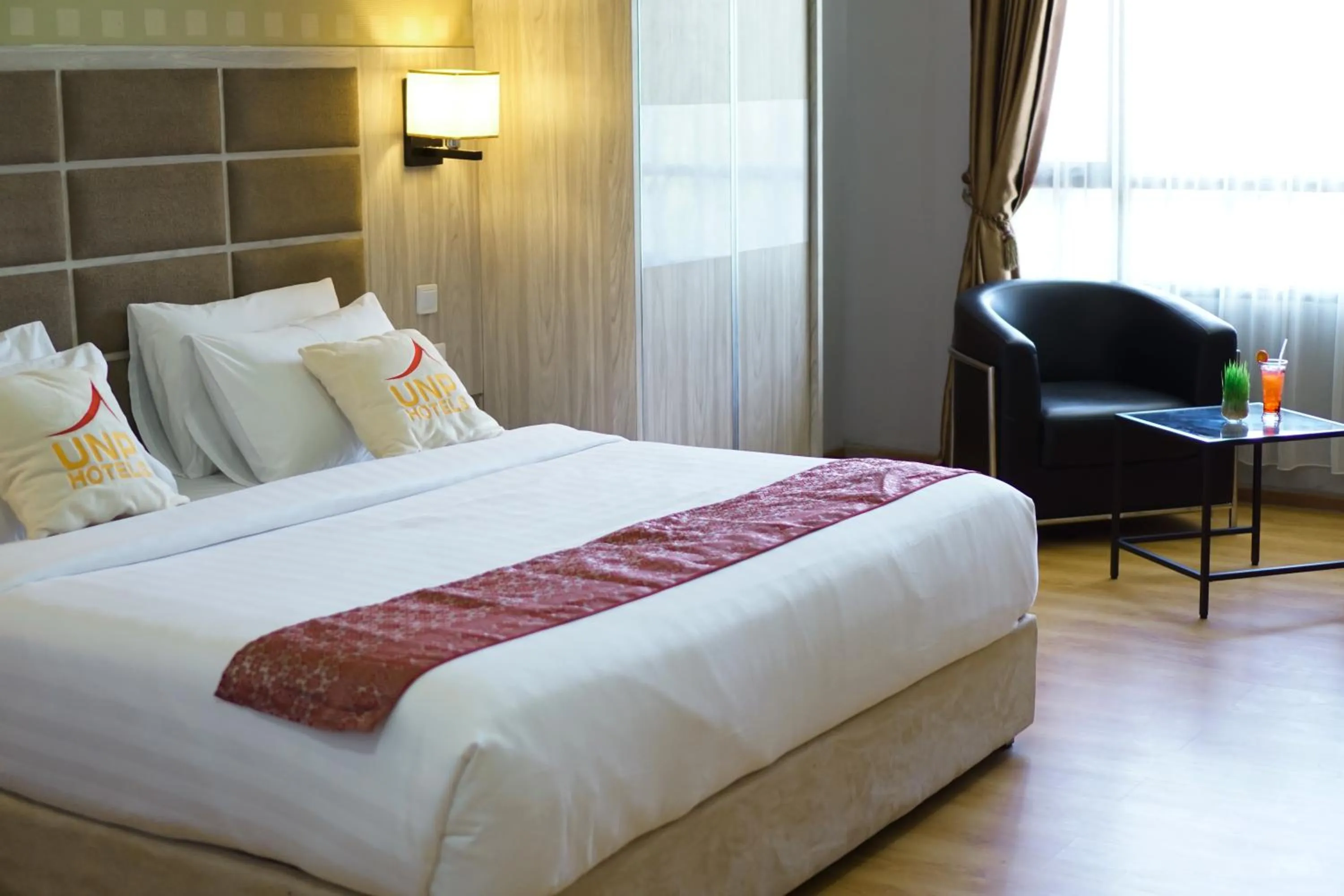 Bed in UNP Hotel & Convention