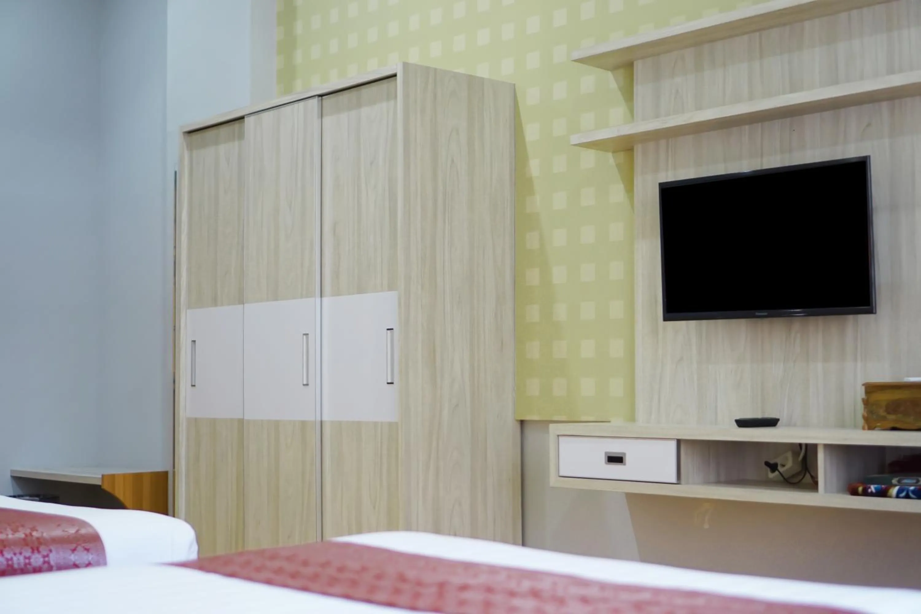 Bed in UNP Hotel & Convention