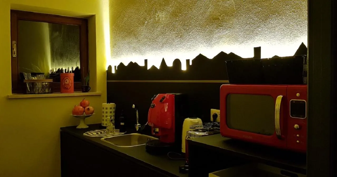 Communal kitchen in Cortile Gancia - Sweet House