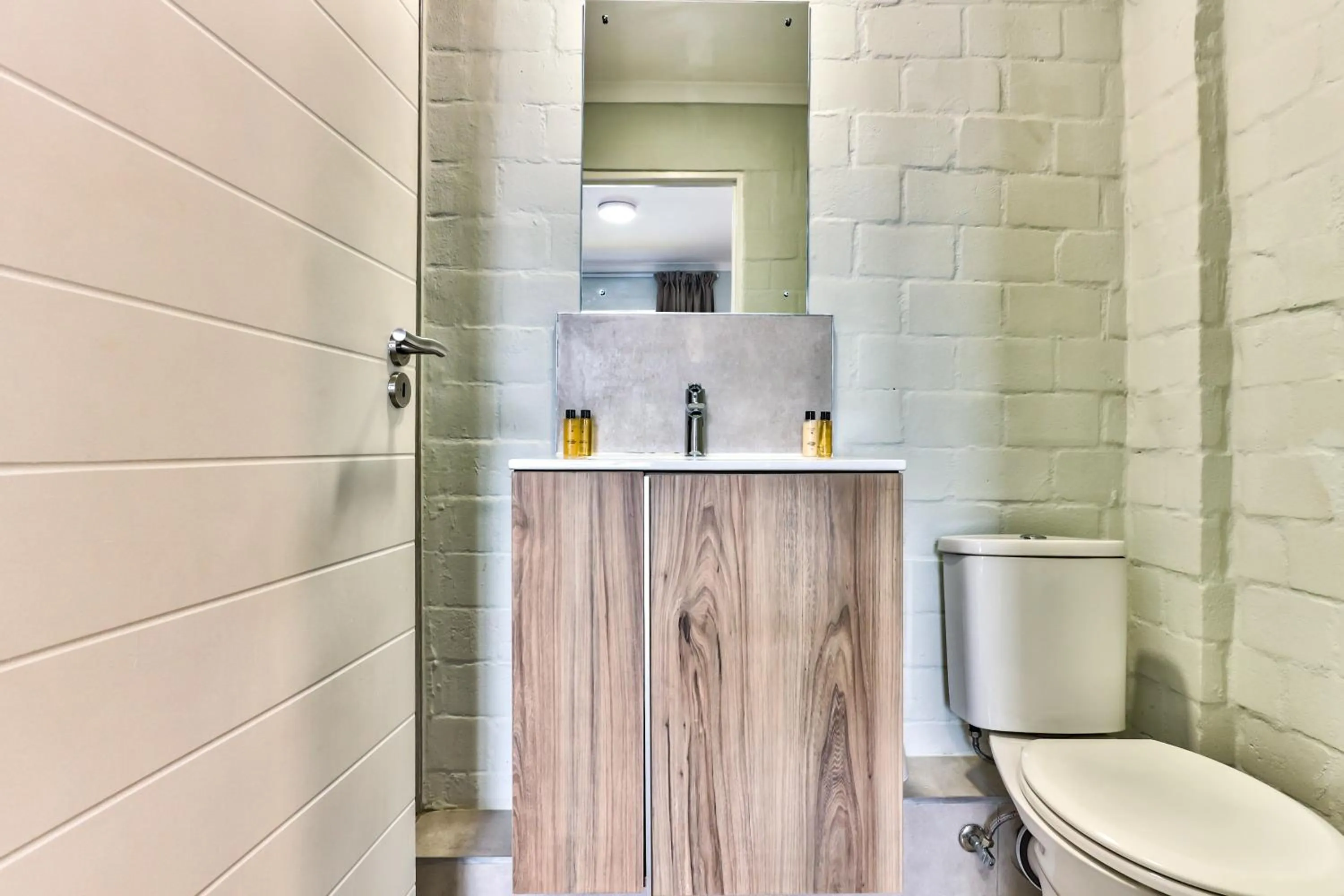 Toilet in WINK Aparthotel Eaton Square