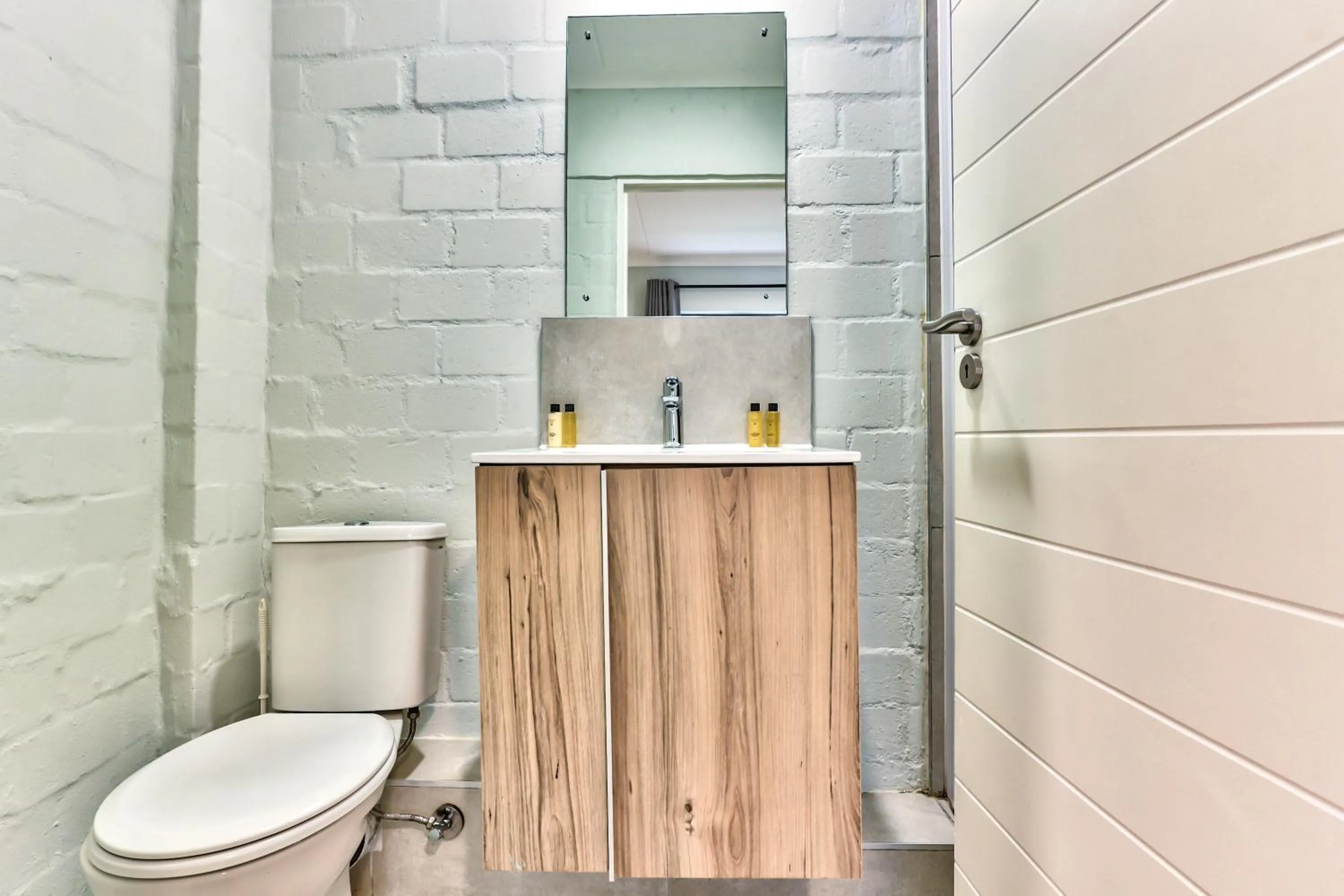 Toilet in WINK Aparthotel Eaton Square