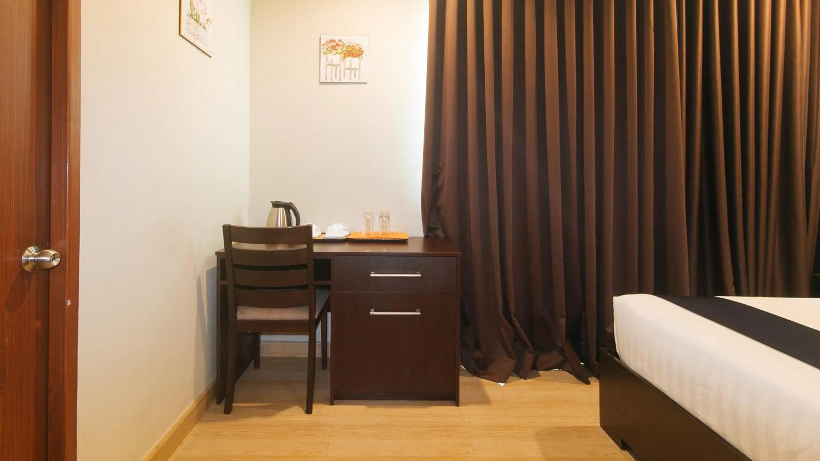 Seating area, Bed in Asrodel Hotel RedPartner