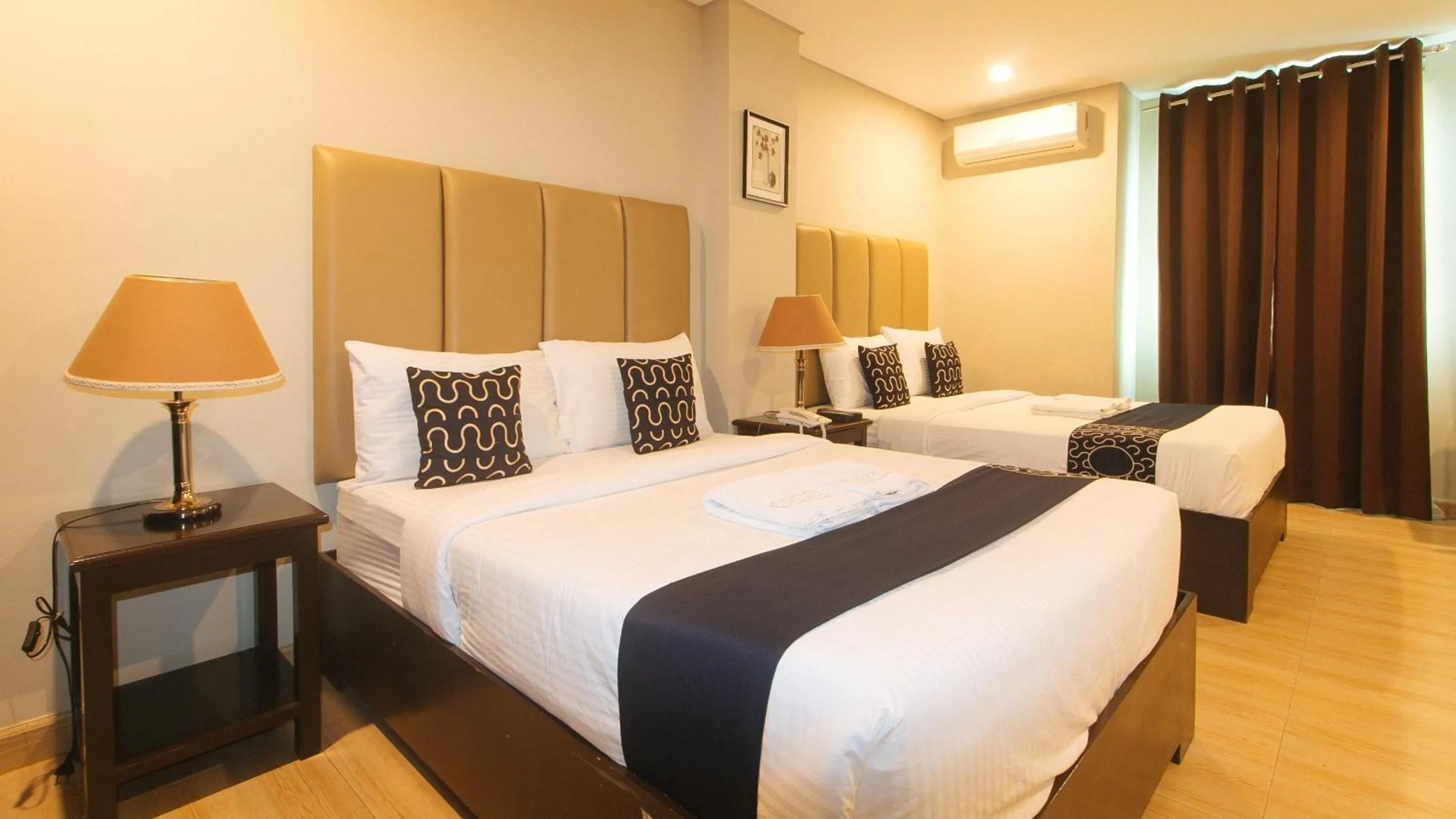 Bed in Asrodel Hotel RedPartner