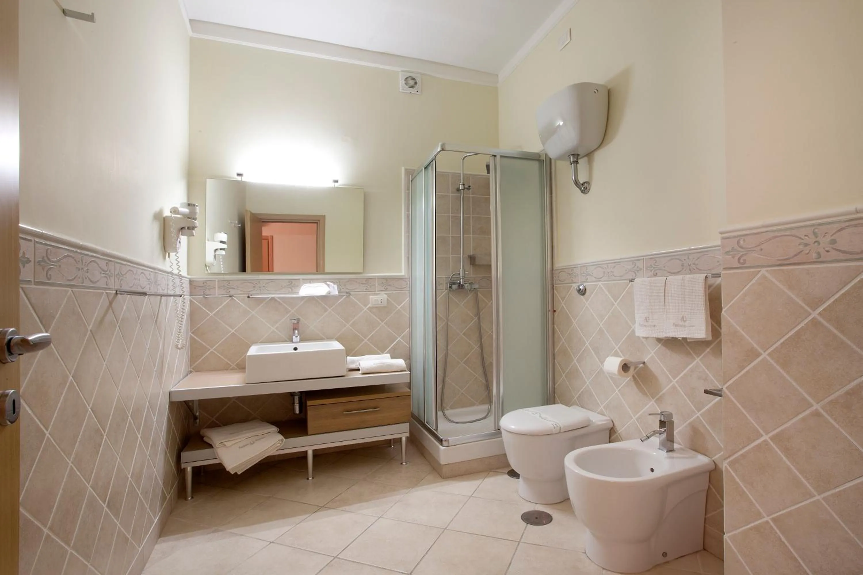 Bathroom in Posidonia Residence
