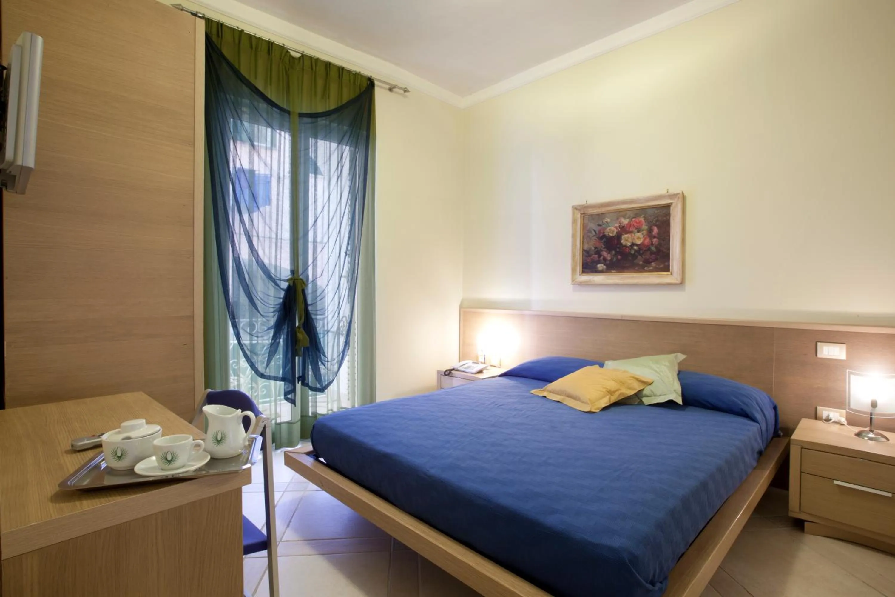 Bed in Posidonia Residence