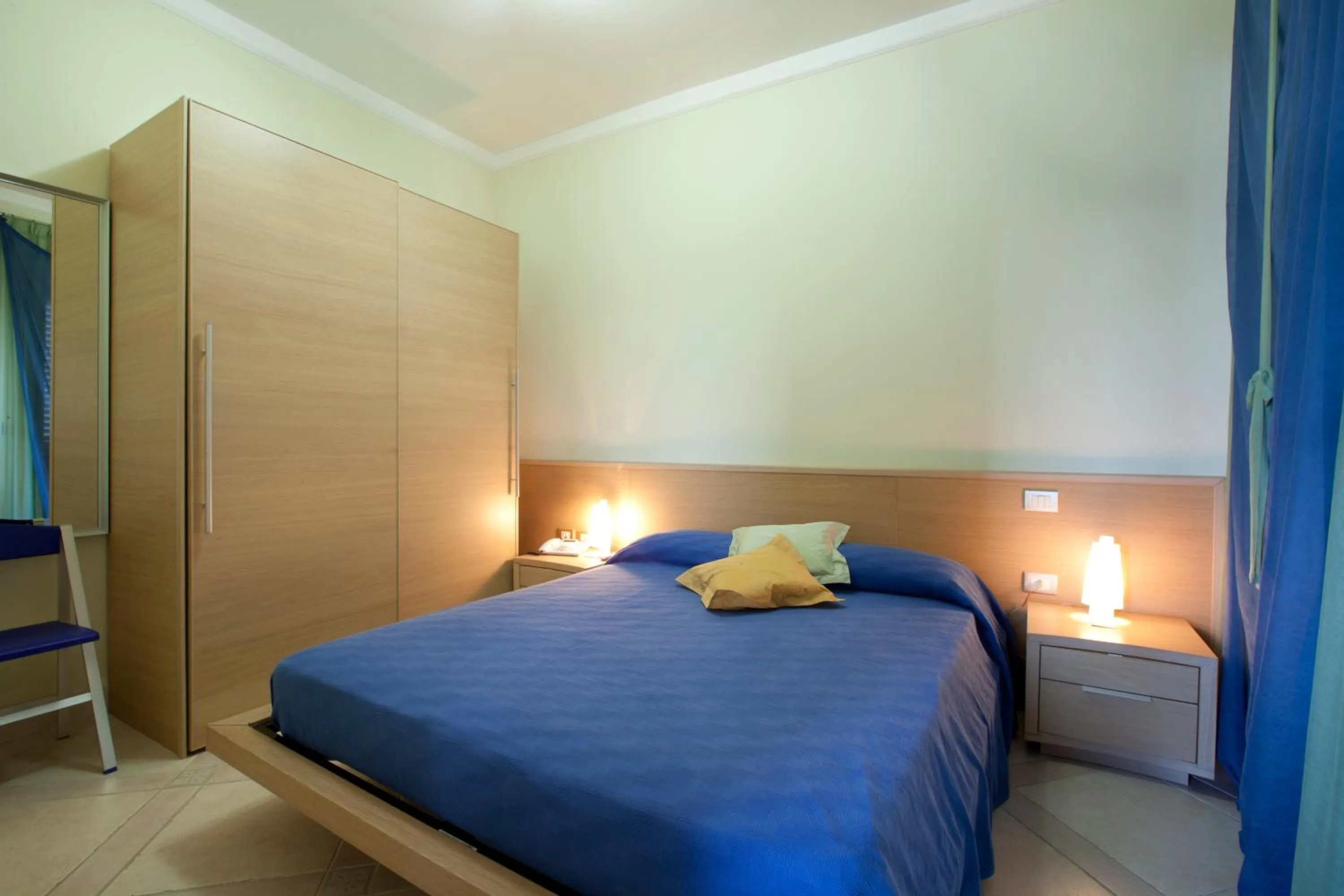 Bed in Posidonia Residence