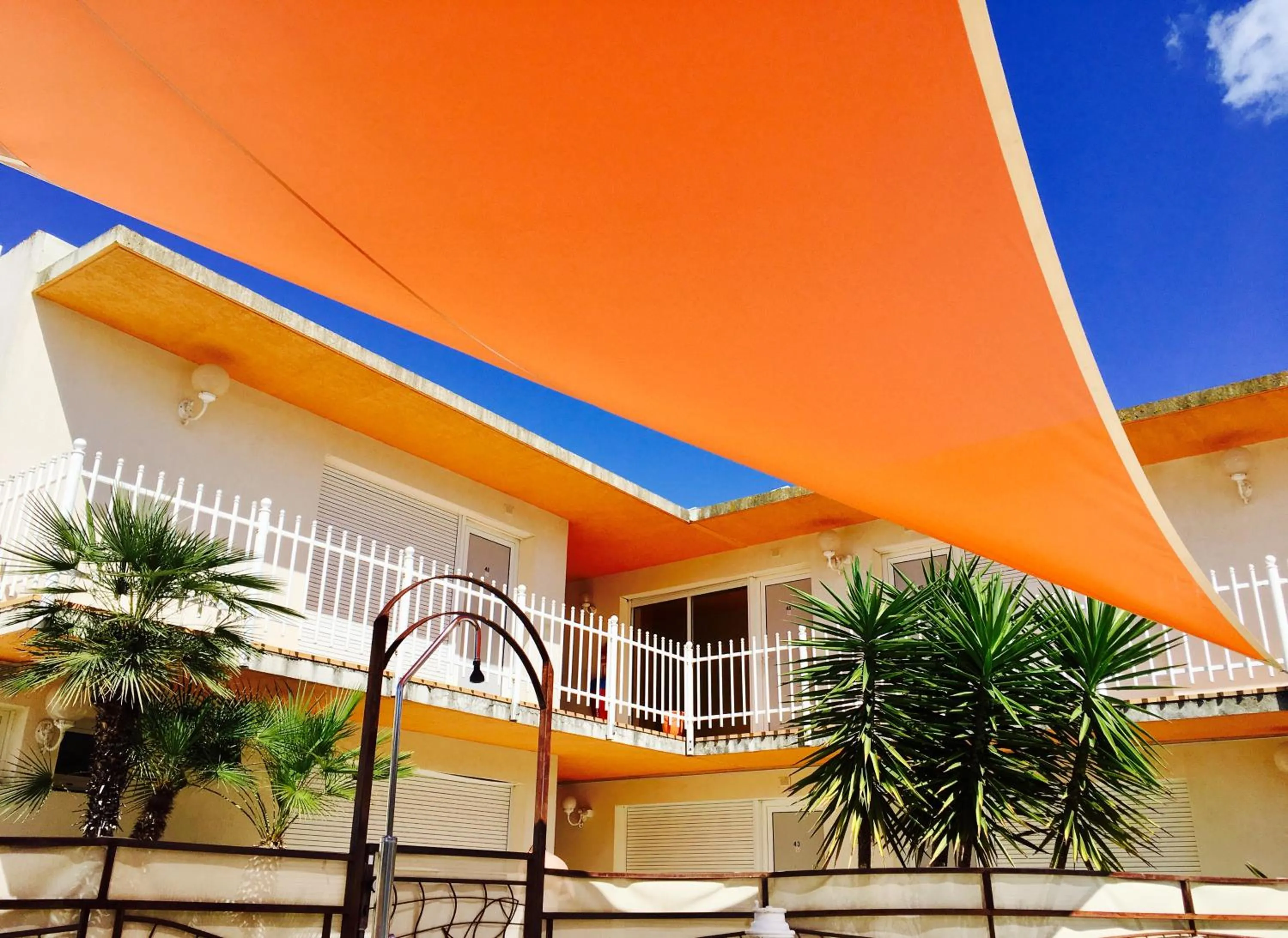 Balcony/Terrace in Amerique Hotel Palavas - Piscine - Plage
