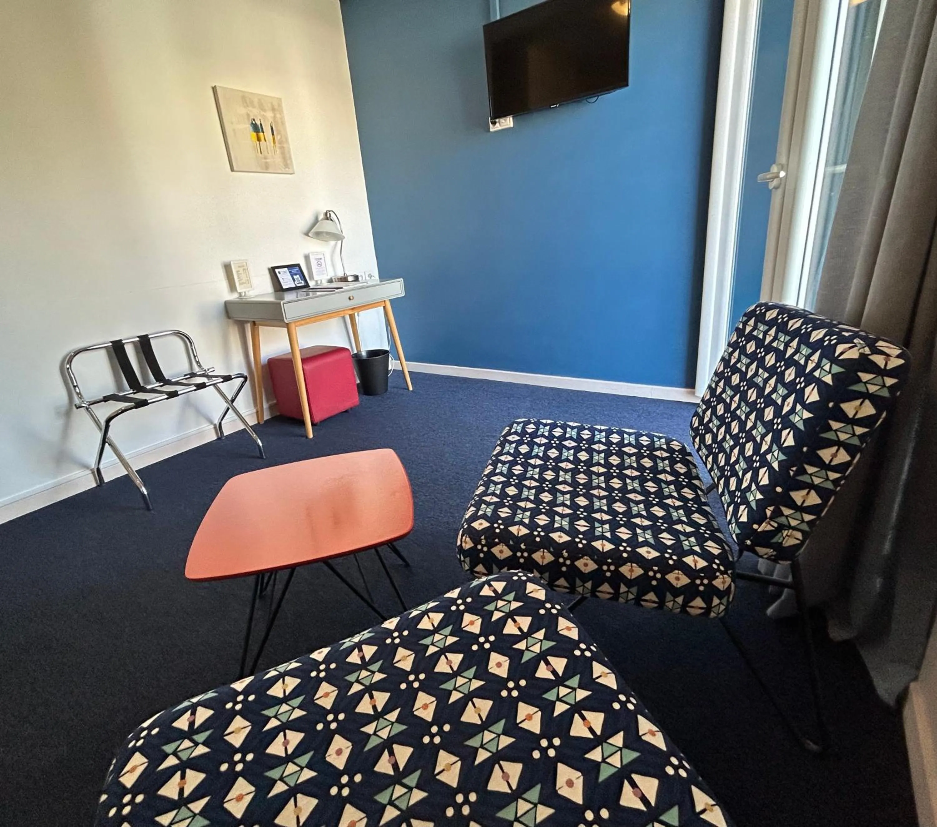 Living room in Amerique Hotel Palavas - Piscine - Plage