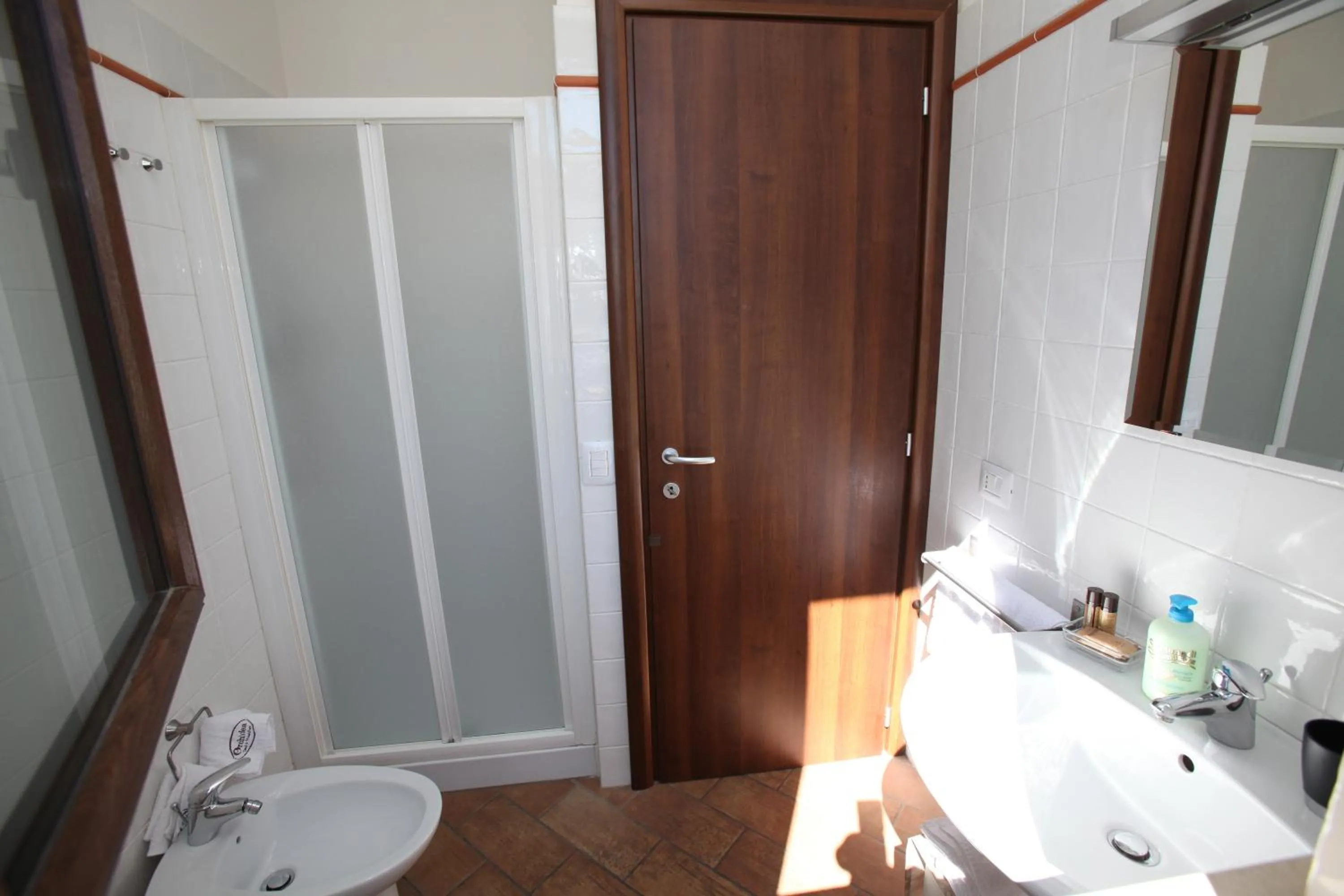Bathroom in Orchidea Rooms & Suites