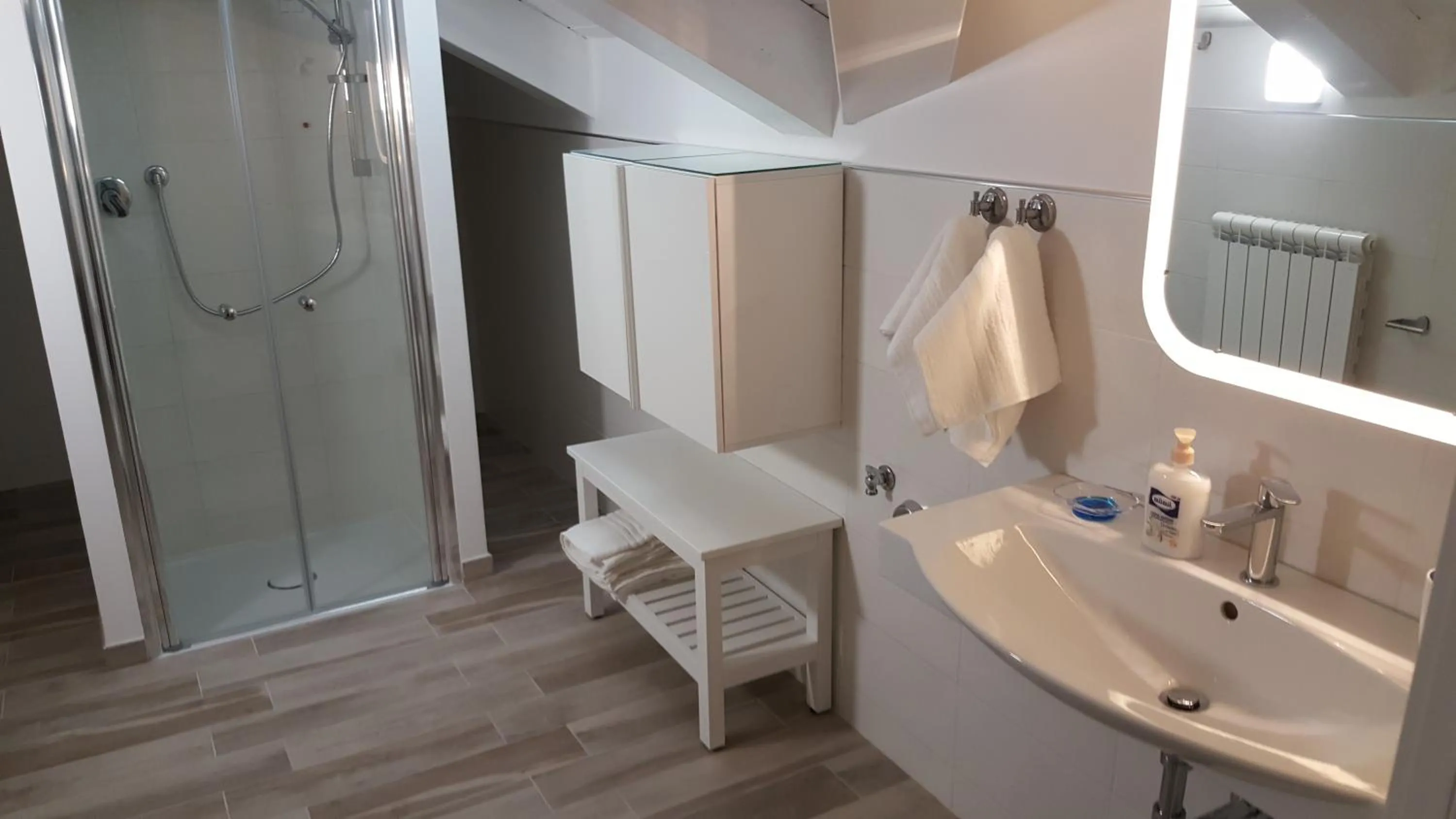 Bathroom in Orchidea Rooms & Suites