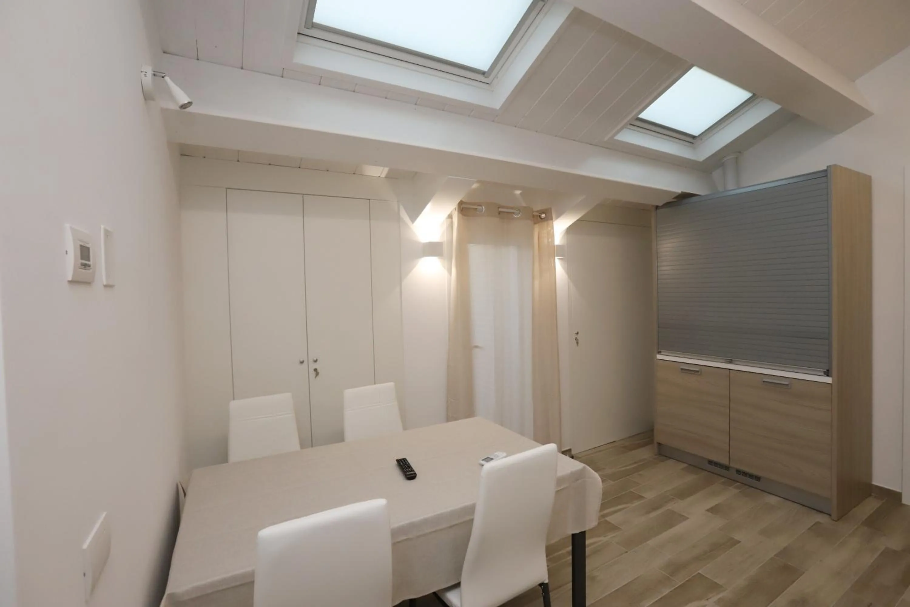 Seating area in Orchidea Rooms & Suites