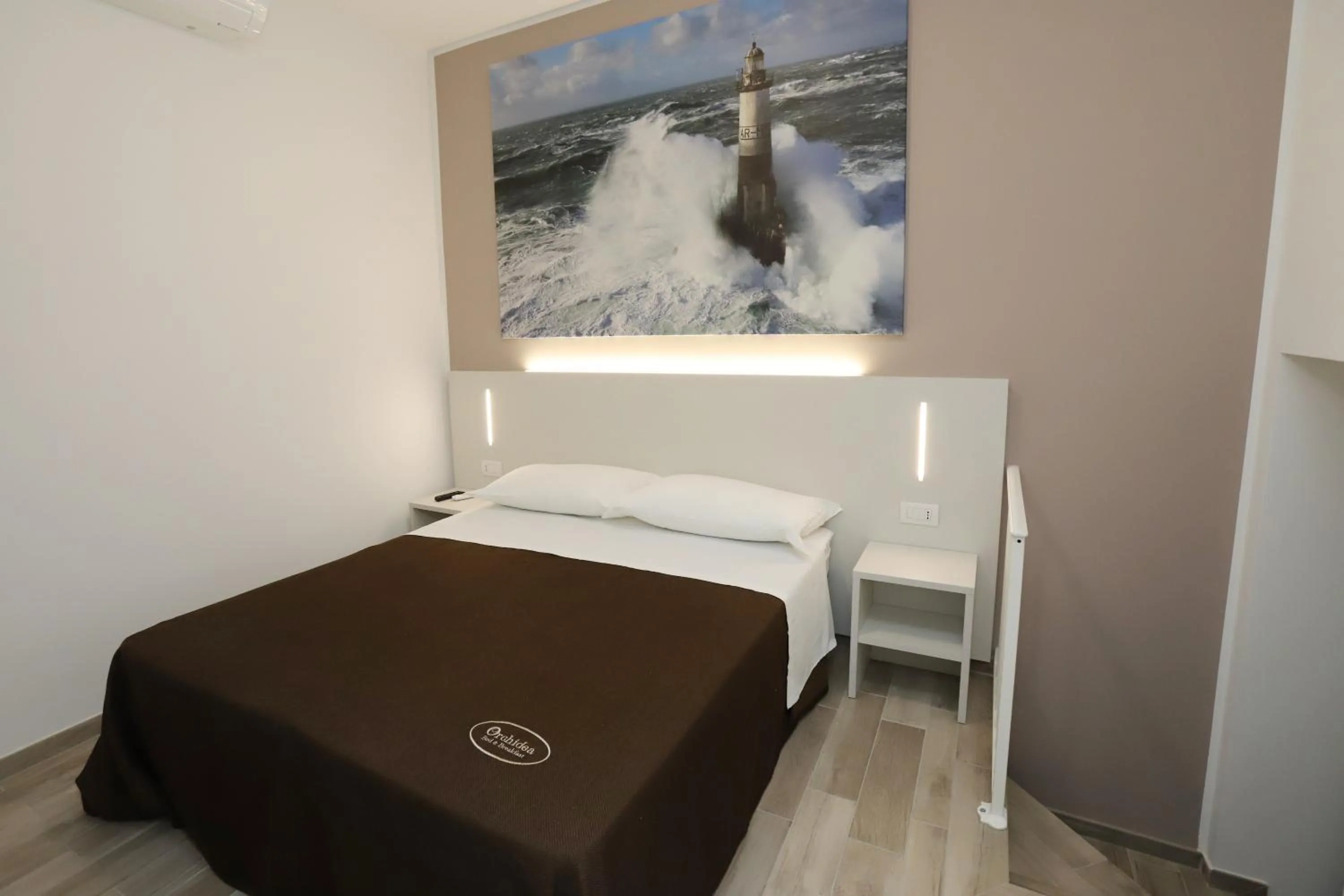 Photo of the whole room, Bed in Orchidea Rooms & Suites
