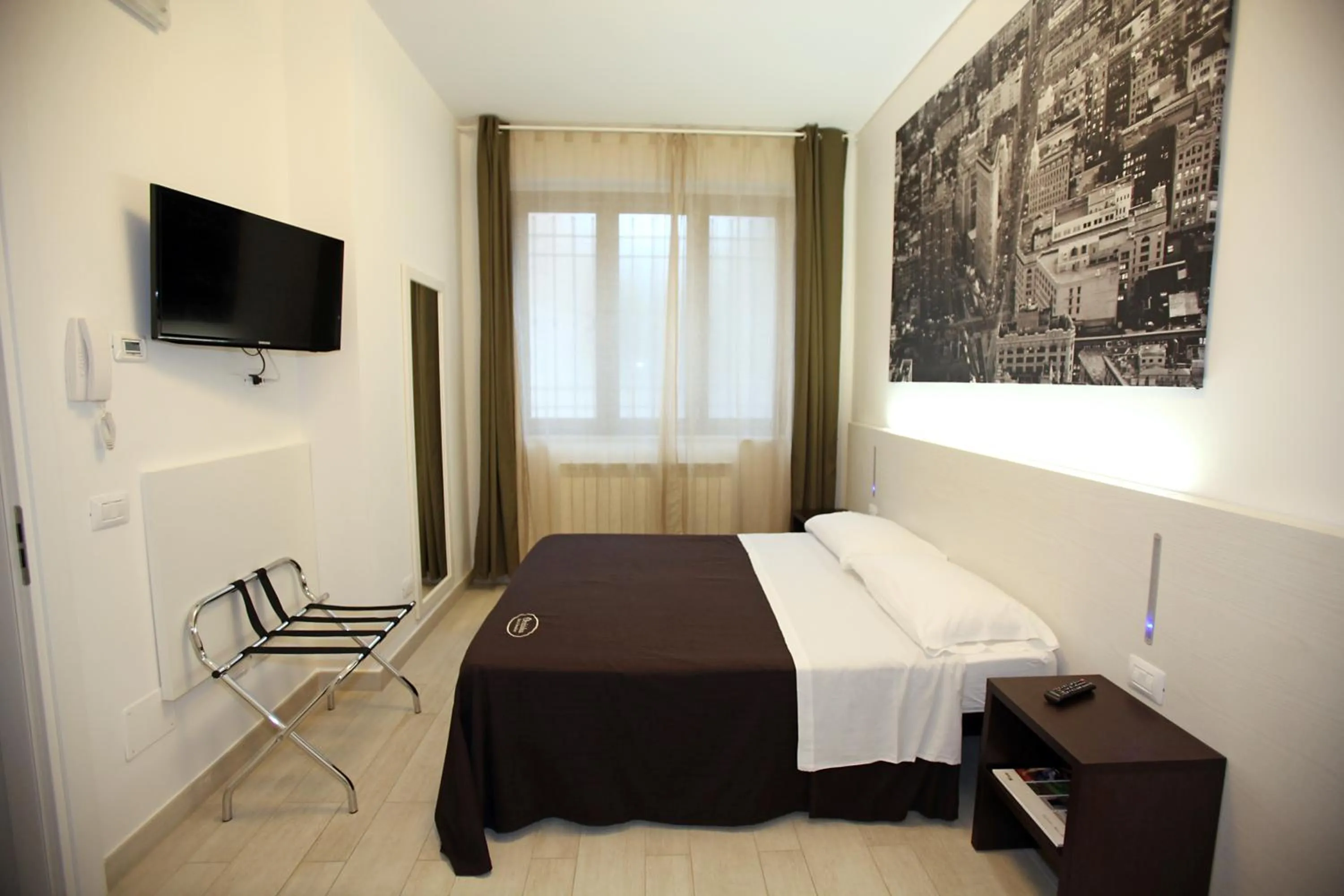 Photo of the whole room, Bed in Orchidea Rooms & Suites