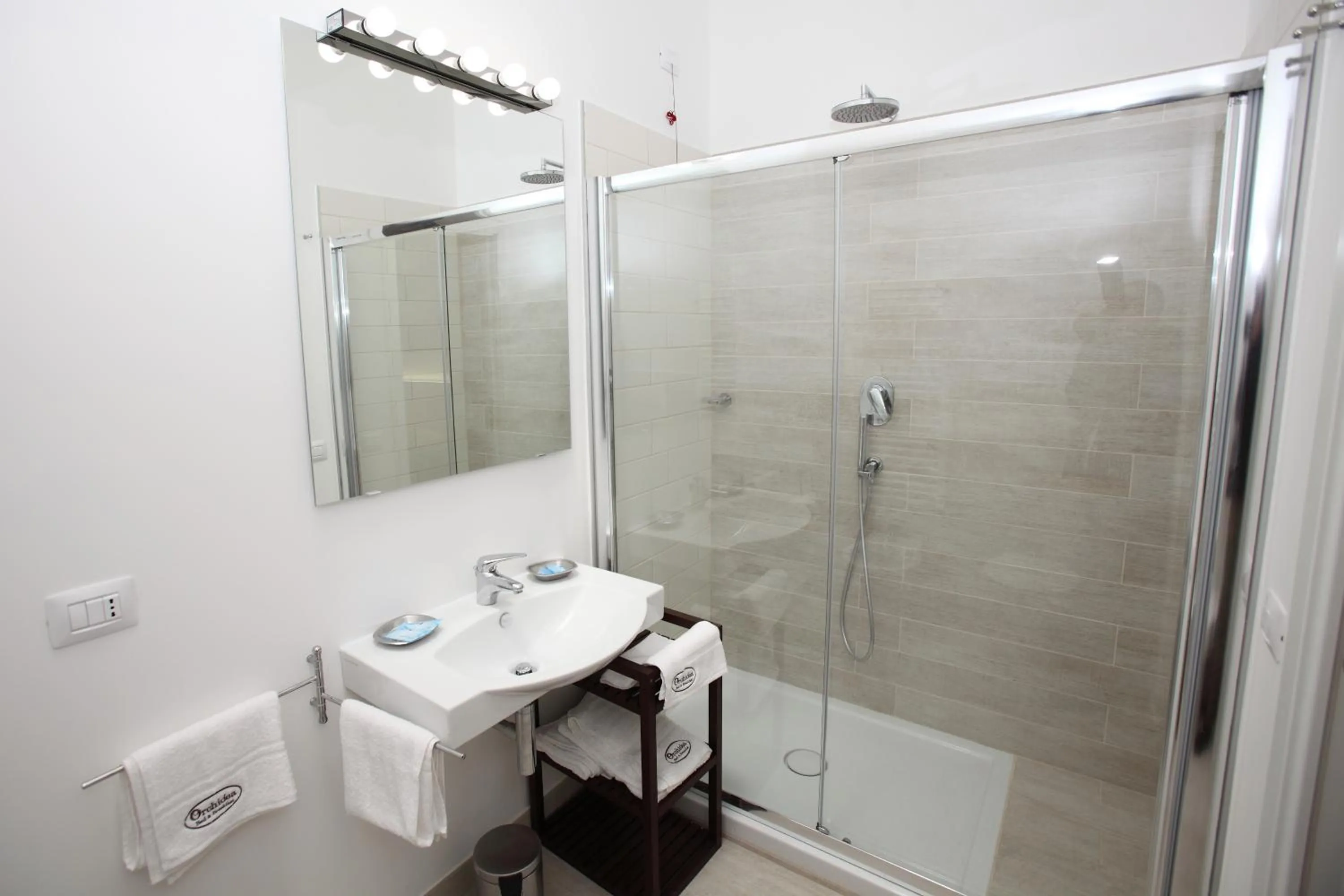 Bathroom in Orchidea Rooms & Suites