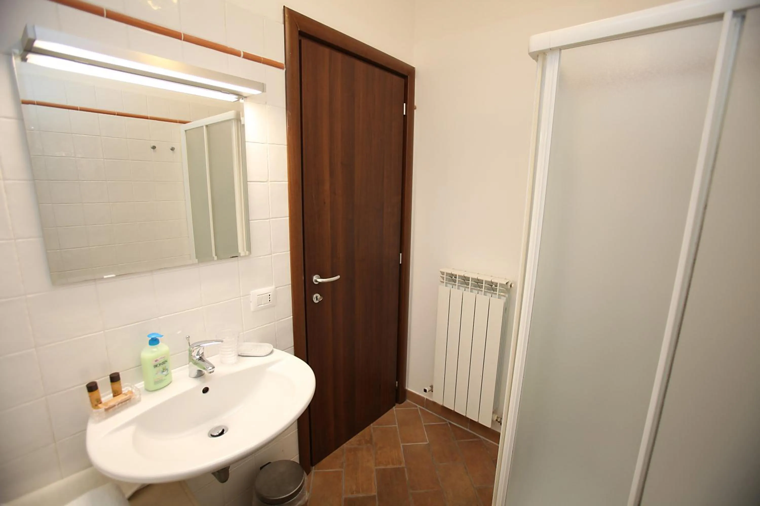 Bathroom in Orchidea Rooms & Suites