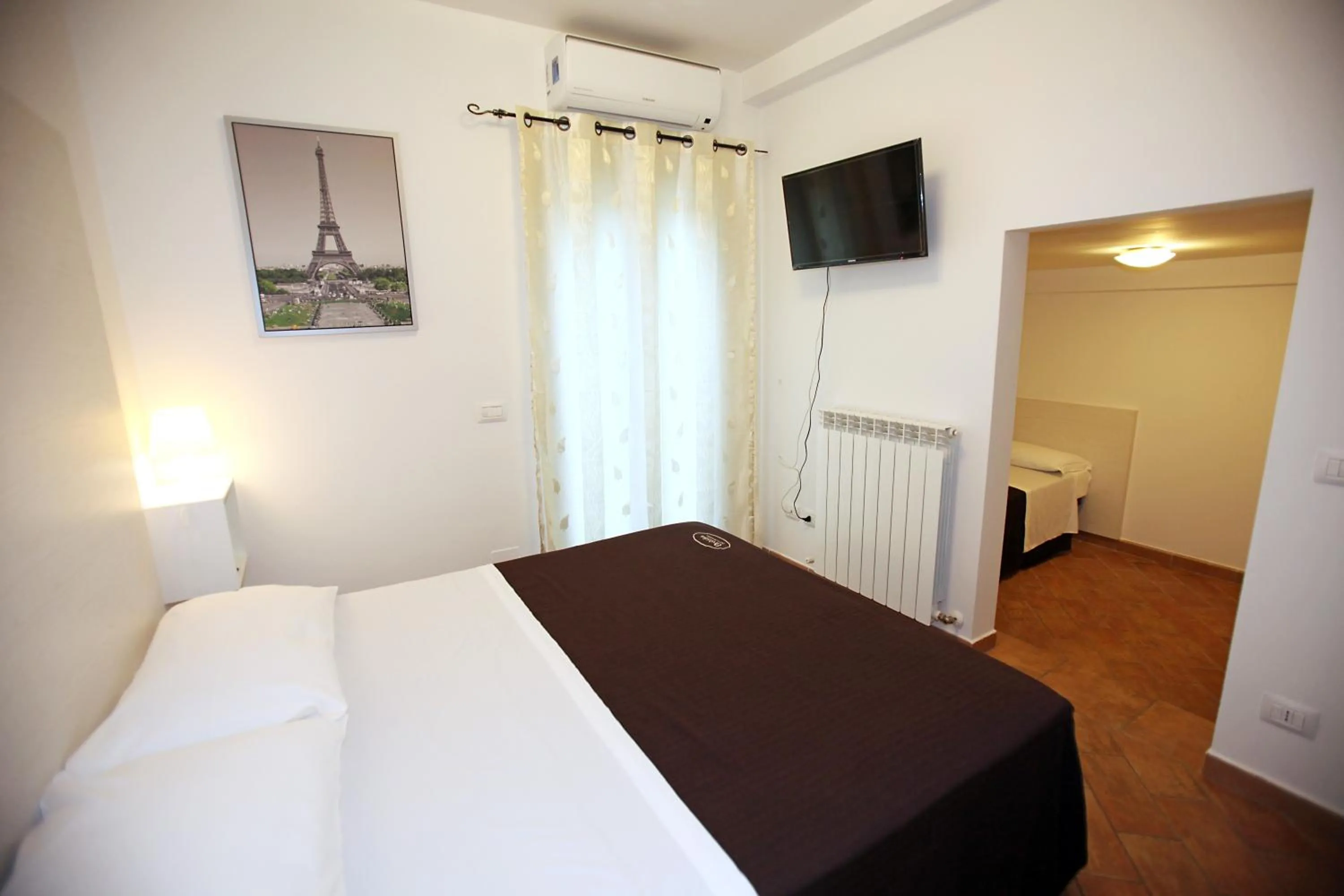 Photo of the whole room, Bed in Orchidea Rooms & Suites