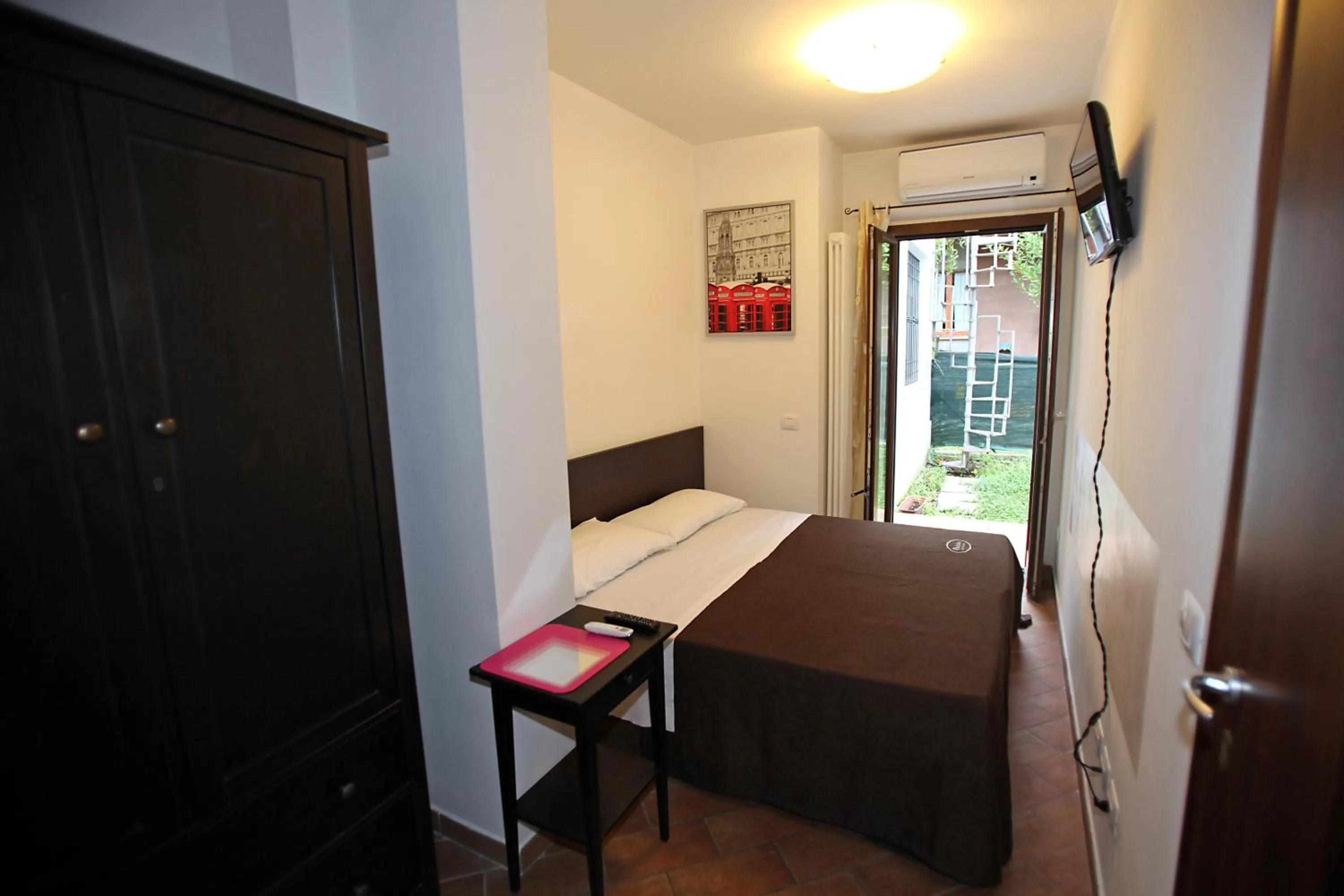 Photo of the whole room, Bed in Orchidea Rooms & Suites