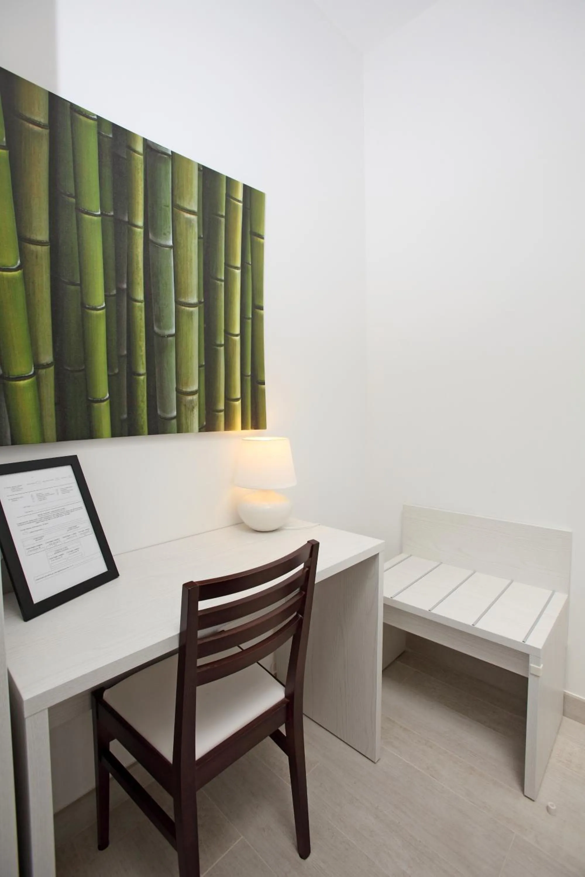 Bedroom in Orchidea Rooms & Suites